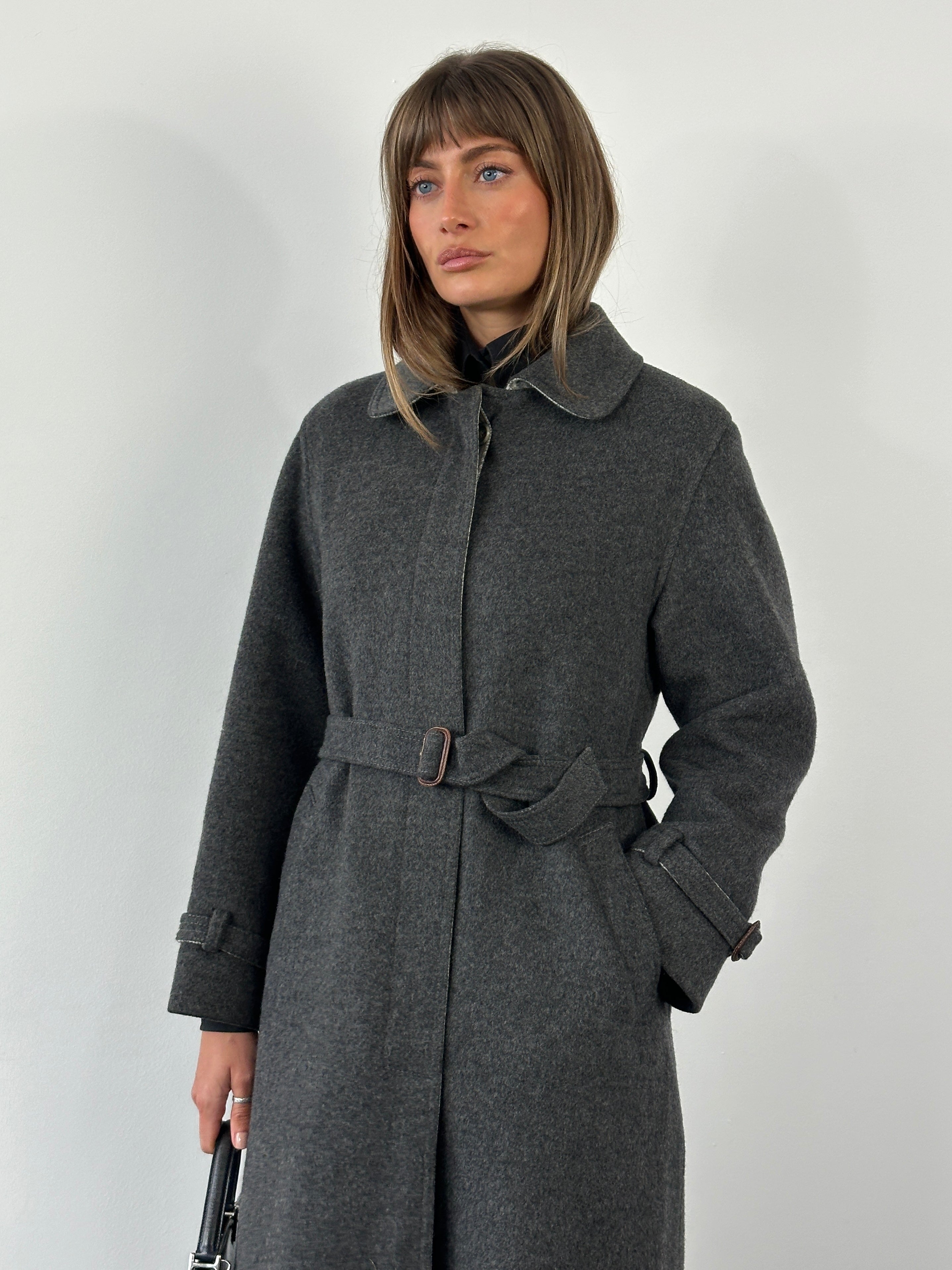 Vintage 1980s wool coat with belted waist and concealed placket, classic vintage style in a size S/M.