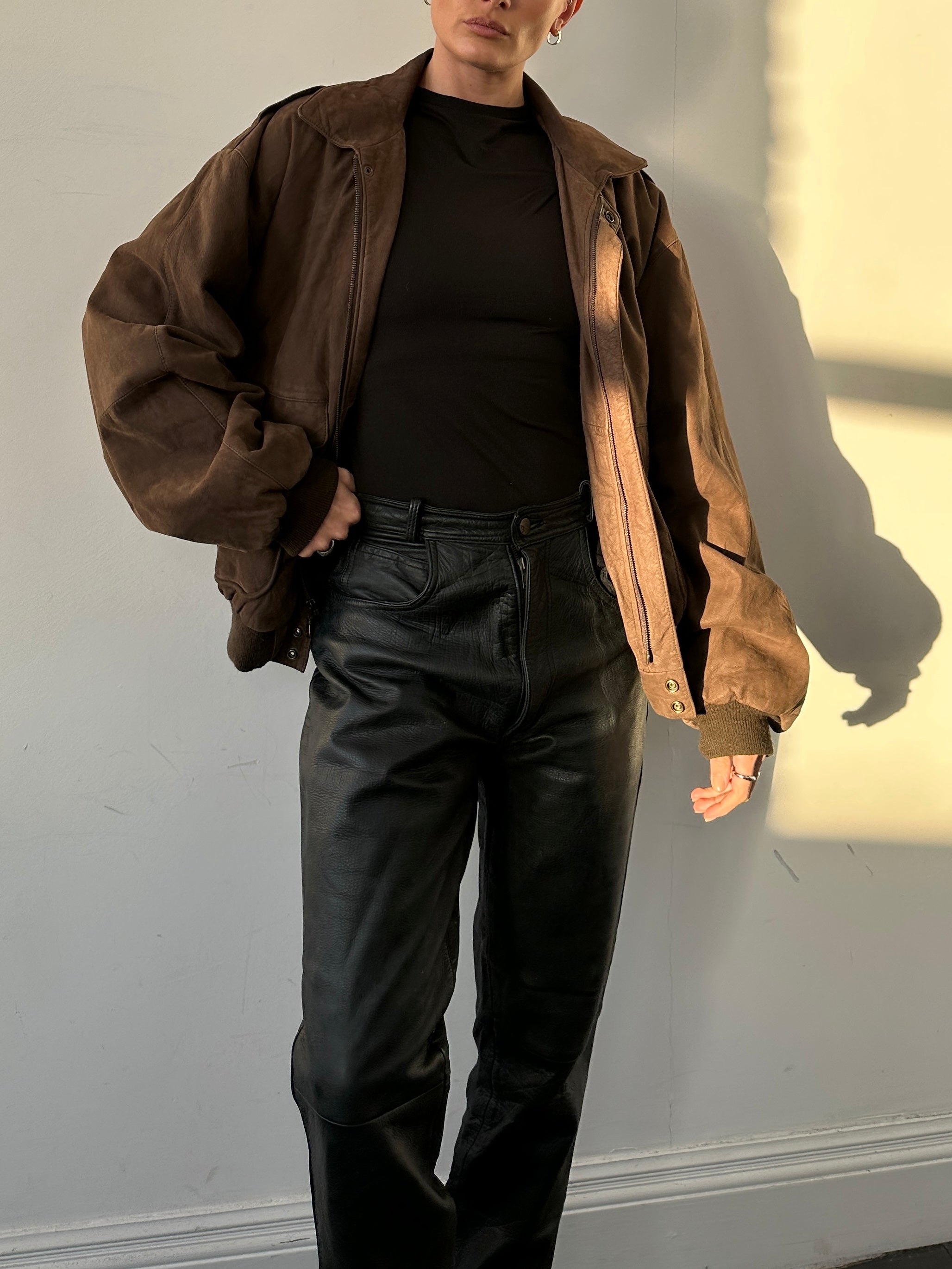 Vintage Nubuck Leather Bomber Jacket in size L, showcasing classic design, smooth texture, and structured fit.