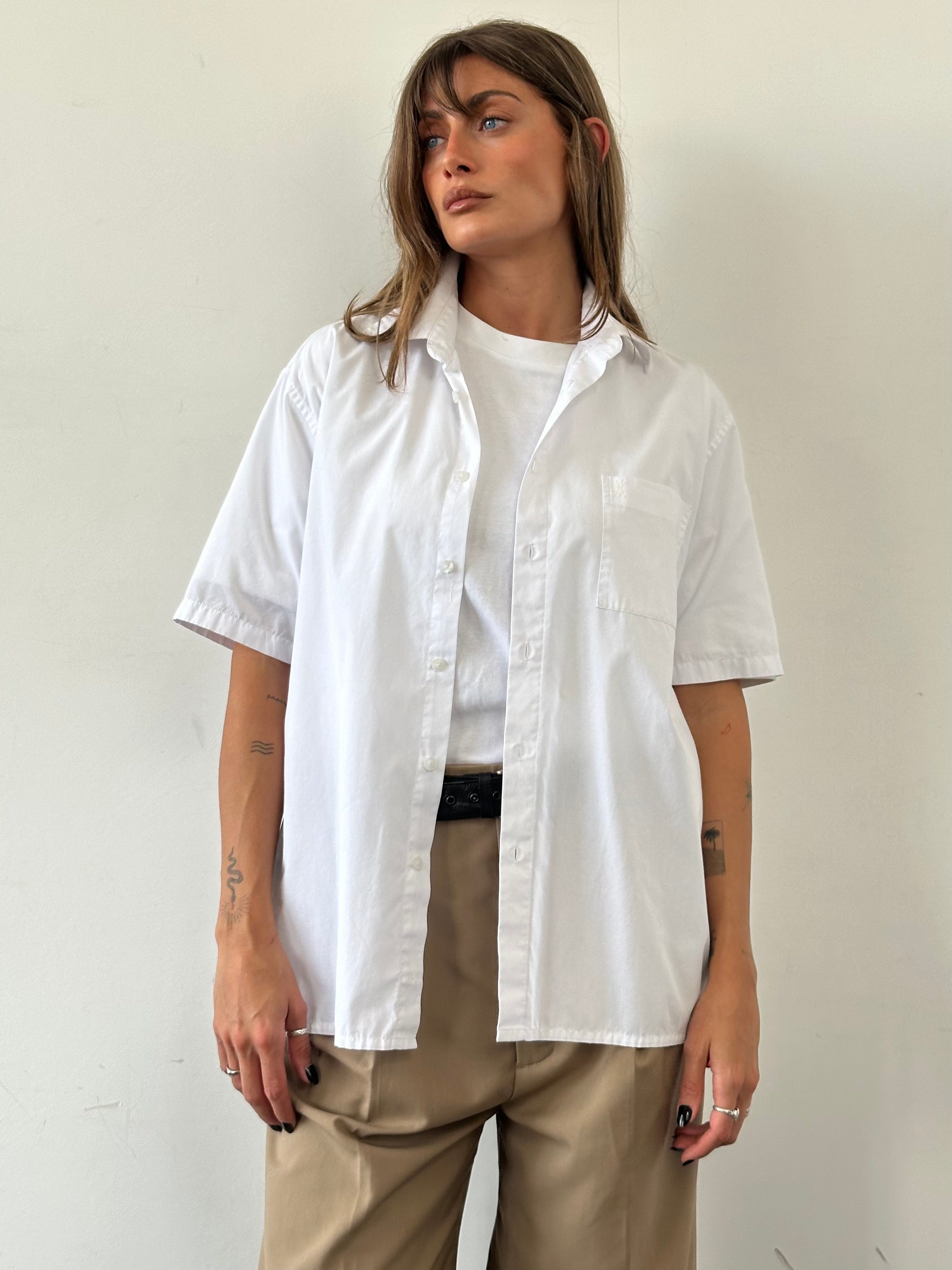 Yves Saint Laurent Pour Homme cotton short sleeve logo shirt in size L, featuring a classic design and brand logo on the chest.