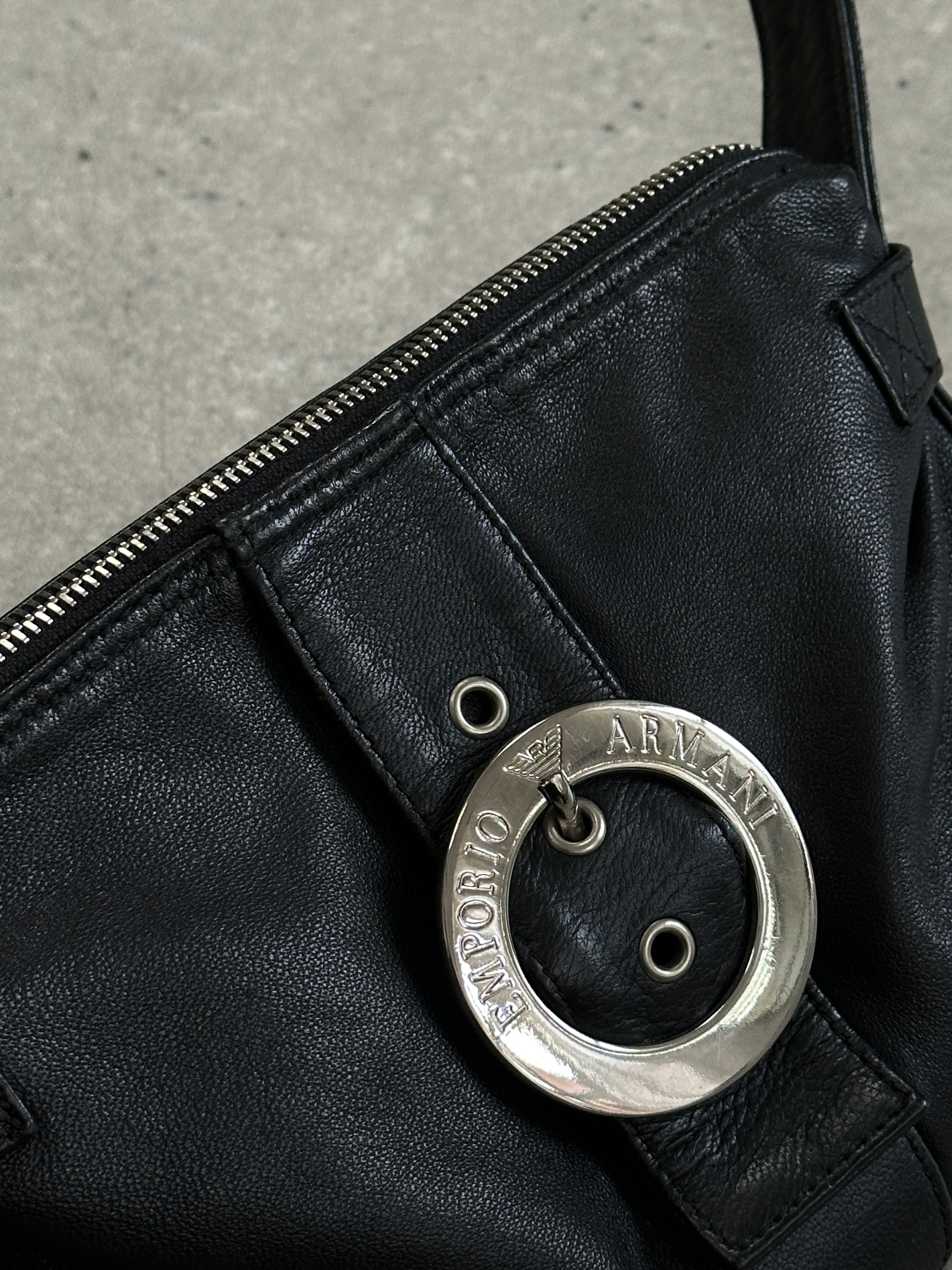 Emporio Armani leather shoulder bag with sleek design, featuring a smooth leather finish and subtle brand detailing.