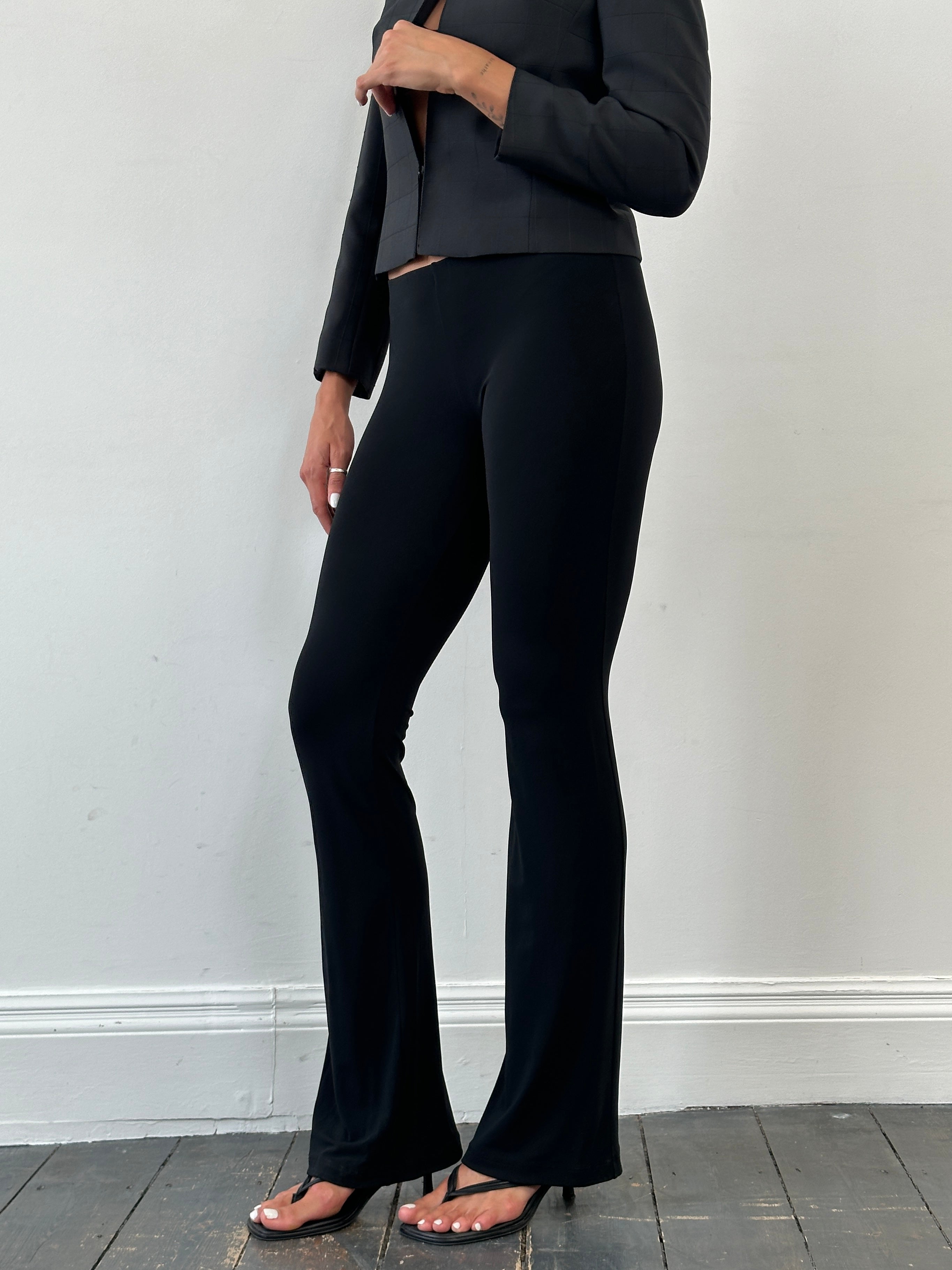 Vintage Italian vintage flared leggings trousers with retro style and high waist, showcasing a classic, wide-leg design.