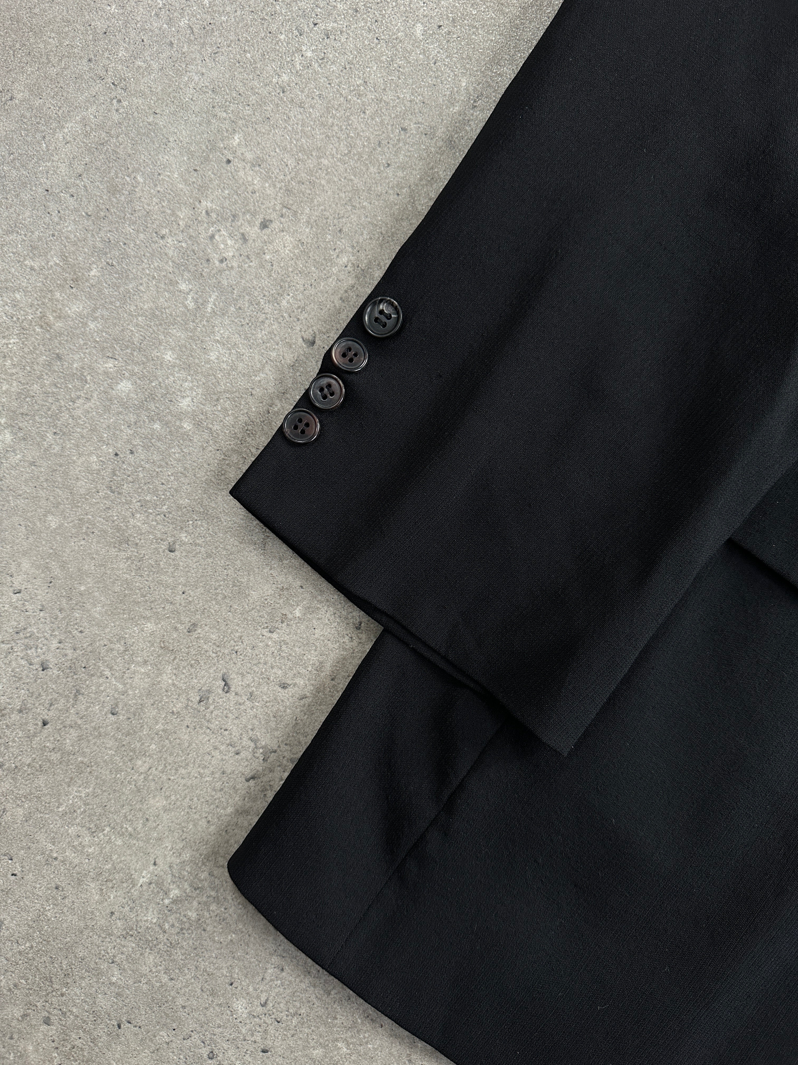 Yves Saint Laurent Pour Homme pure wool single-breasted blazer in size 40R/L, tailored fit with classic lapel and button closure.