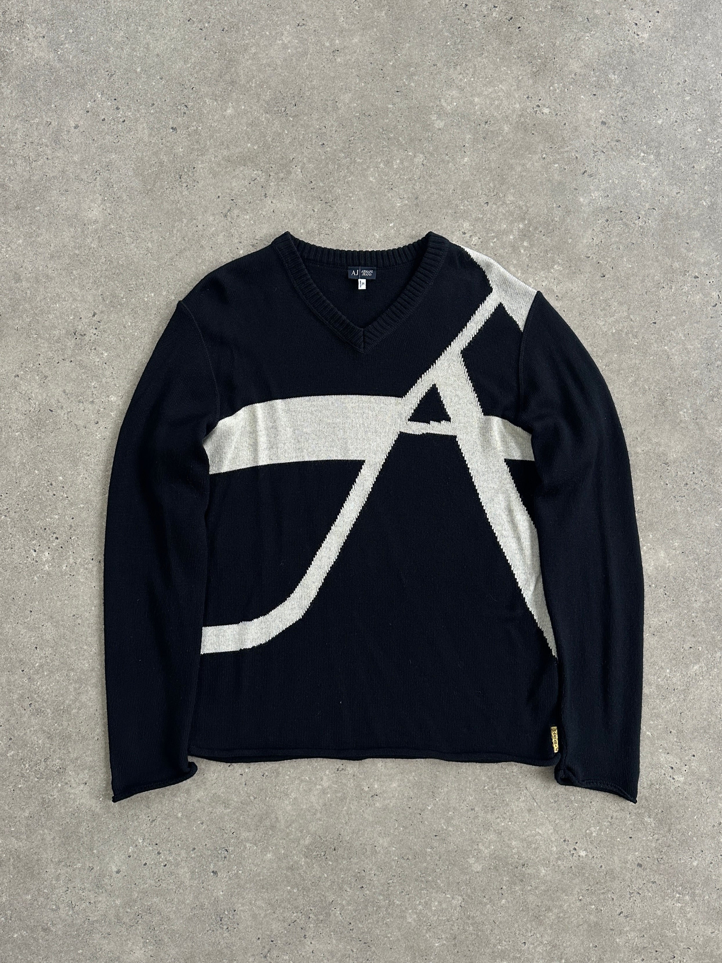 Armani Jeans knitted logo jumper in virgin wool, M/L size, featuring a cozy, stylish design with the Armani logo on the front.