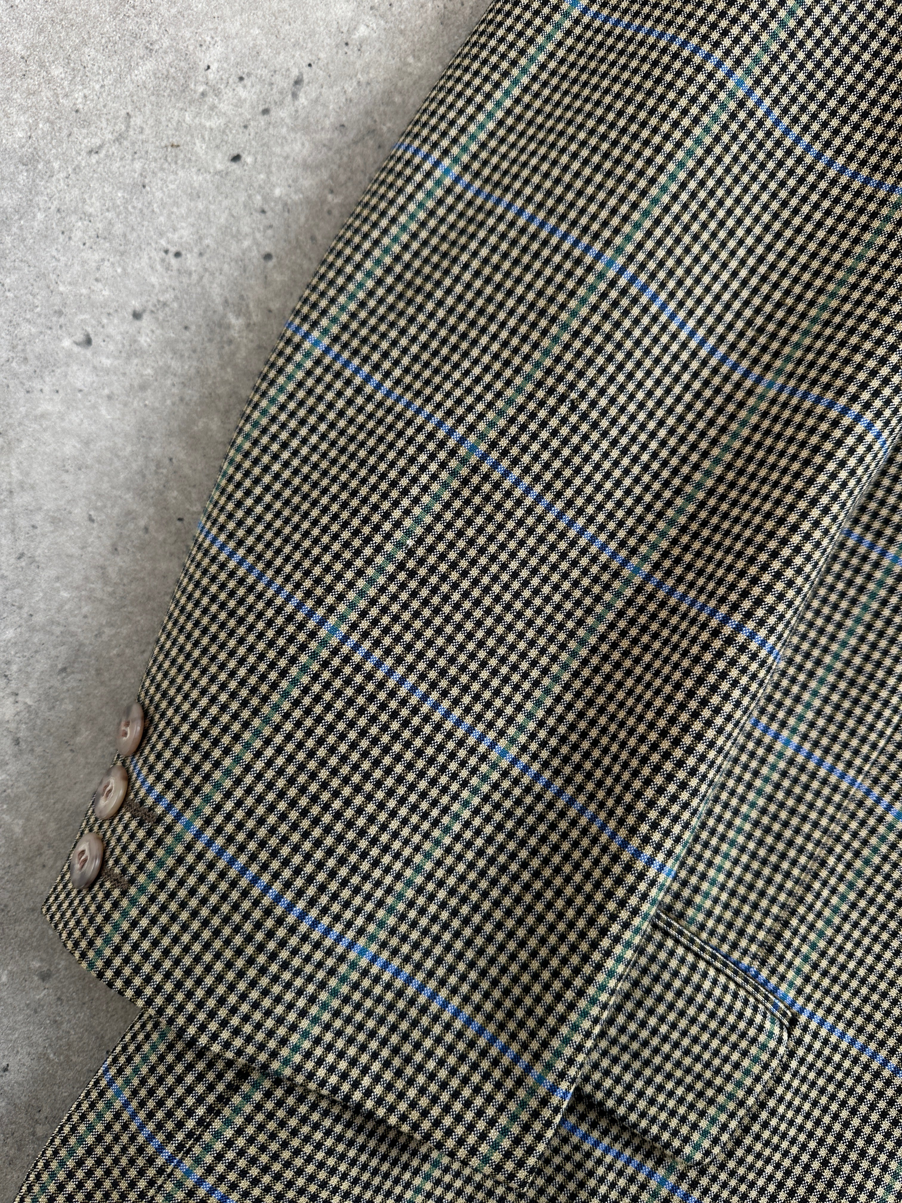 Yves Saint Laurent Pour Homme 1990s wool check blazer, single-breasted, size 44R/XL, showcasing classic tailored style.