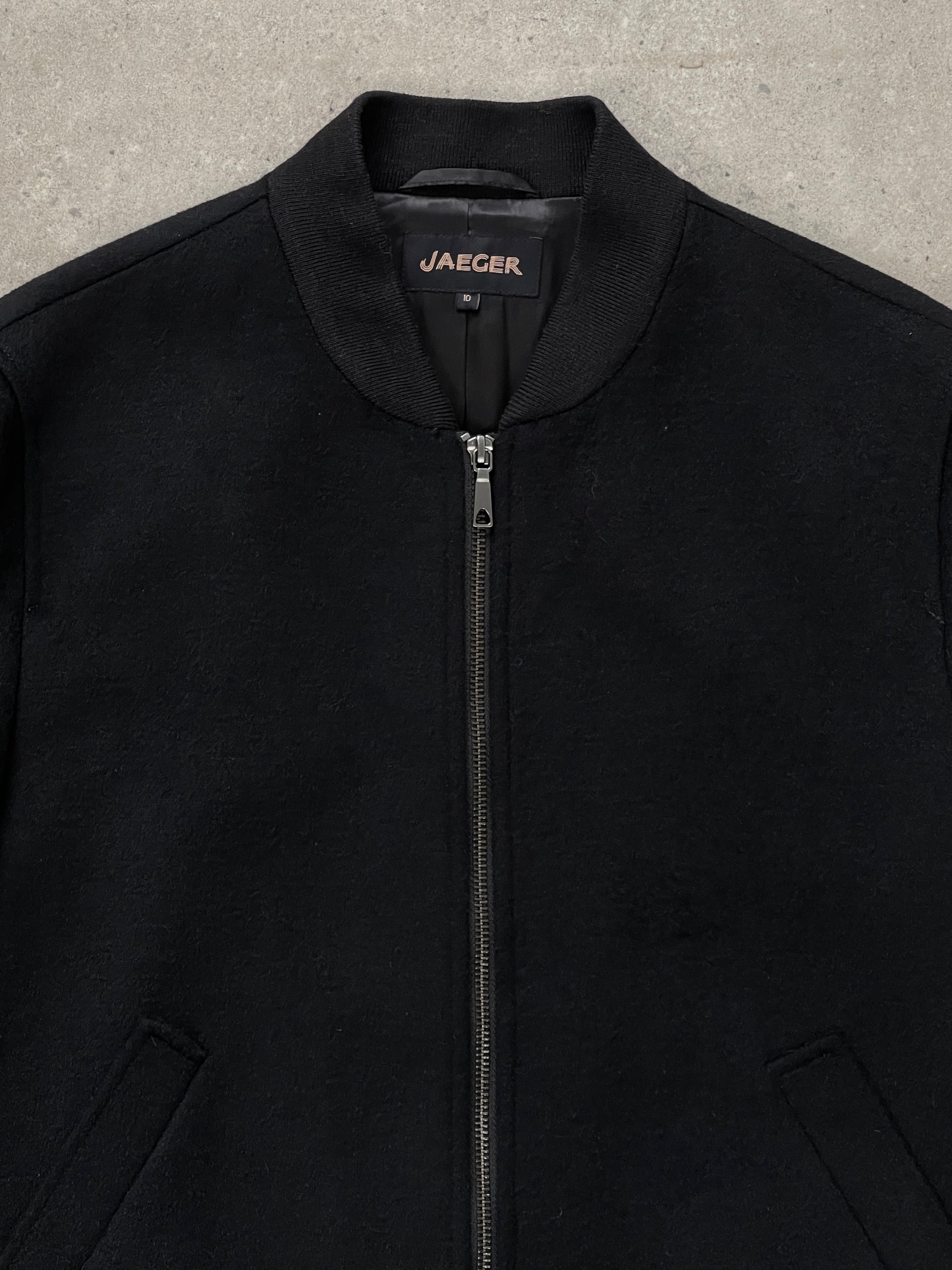 Jaeger minimal pure wool bomber jacket in size S, featuring a sleek design and classic bomber style, shown in the image.