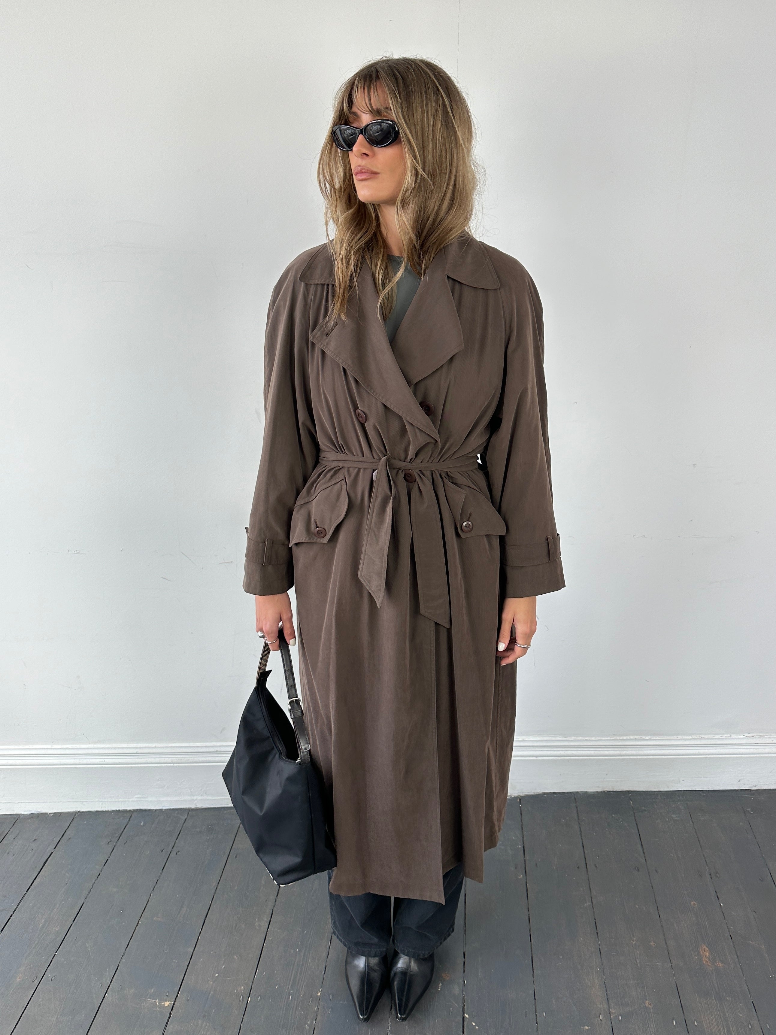 Marella double-breasted belted soft touch trench coat in beige, showcasing classic lapels and waist belt on a model.