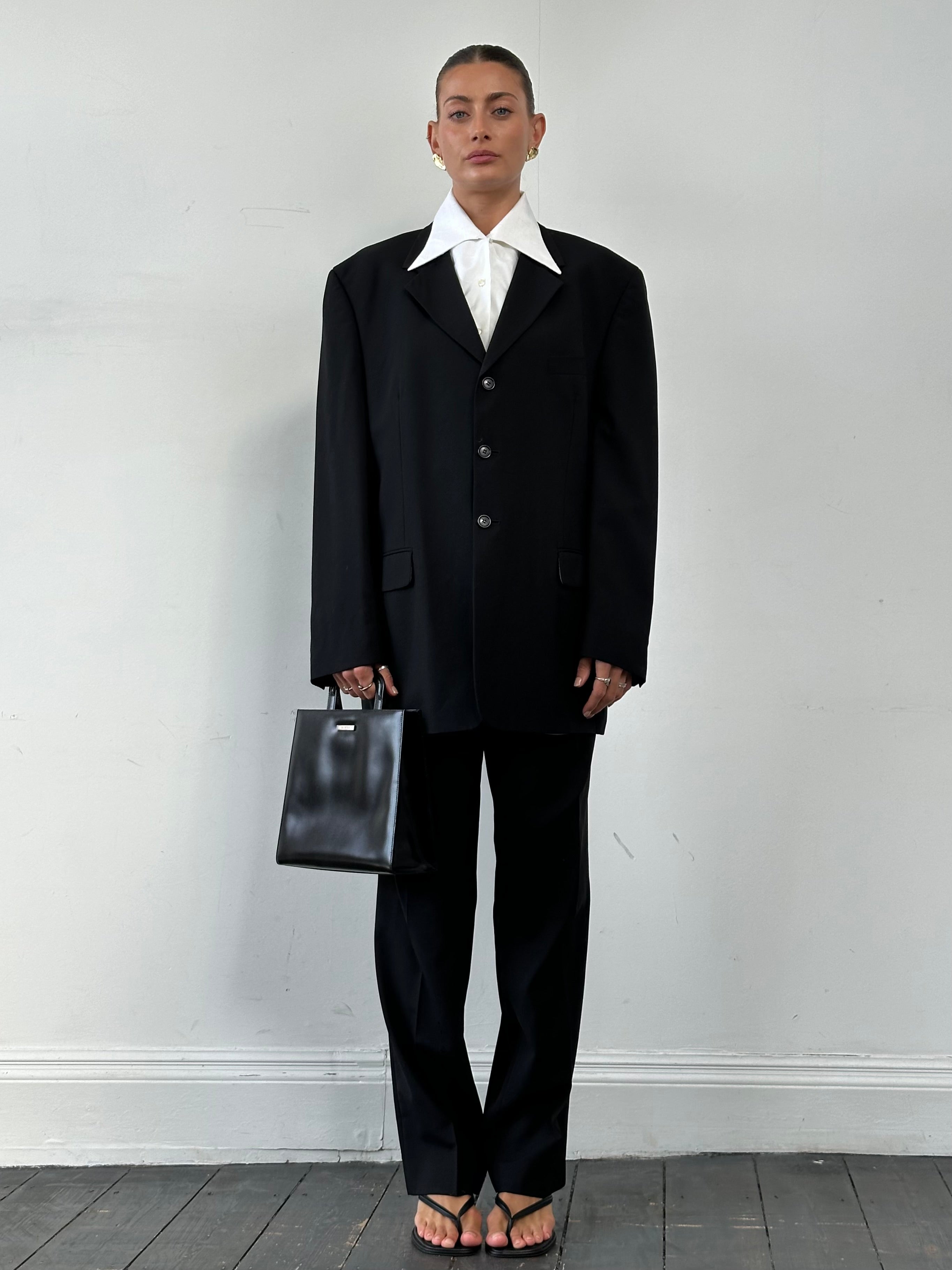 Pierre Cardin pure wool single-breasted blazer in XL/XXL, shown on a hanger with a tailored fit and classic lapel design.