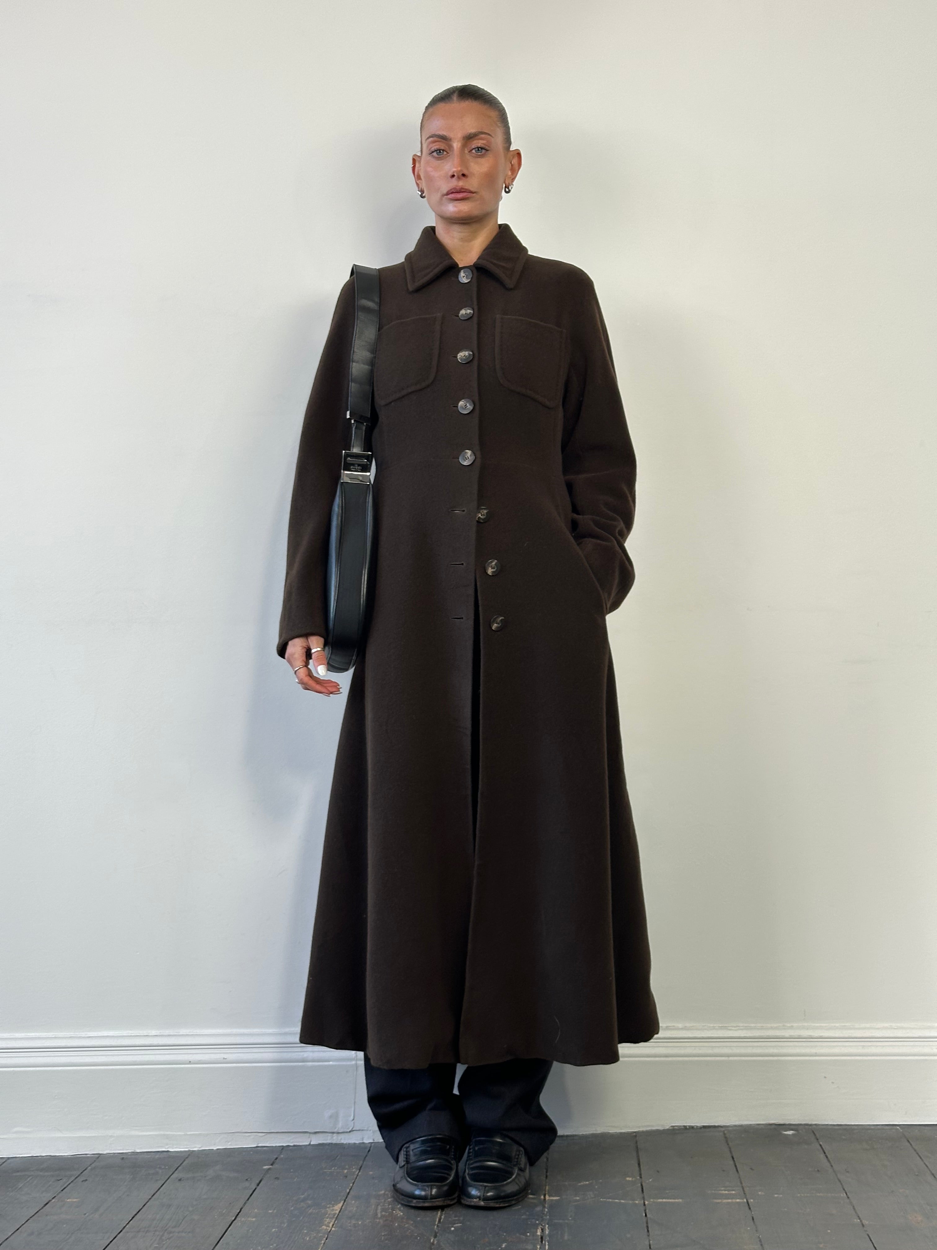 Max Mara pure wool A-line floor-length coat in size M, shown hanging on a hanger with a classic beige color and tailored fit.