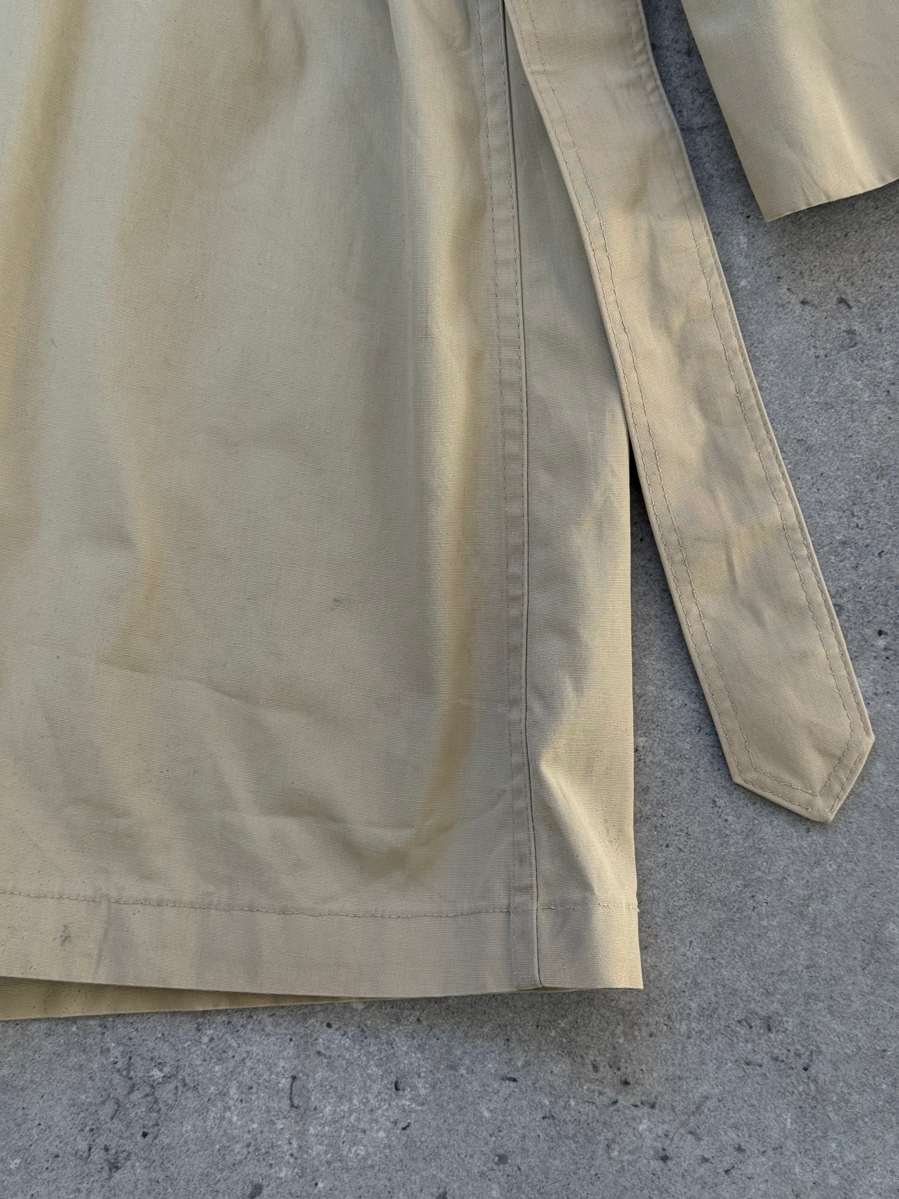 Christian Dior Paris 1980s cotton belted trench coat, stylish beige coat with classic design and belt at waist.