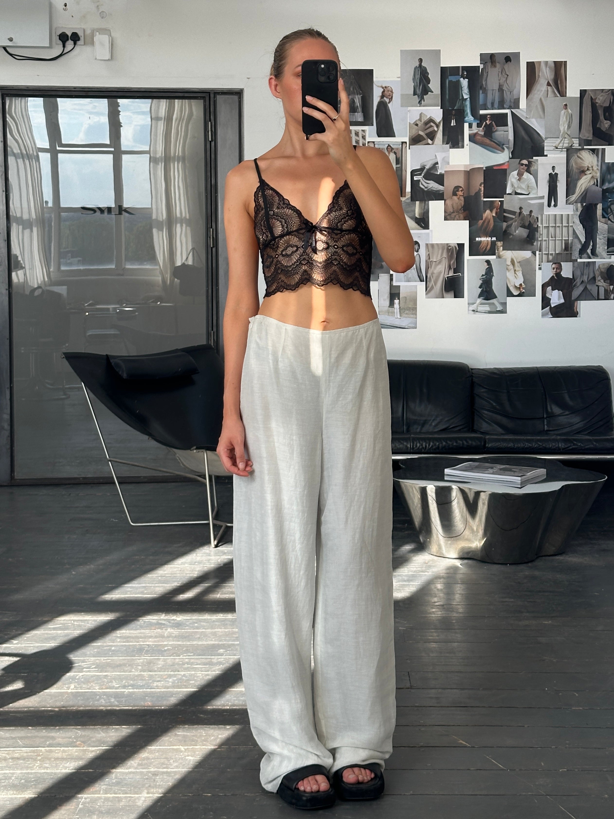 Vintage 2010s lace bralette top in size small, featuring delicate lace fabric and a stylish, feminine design.