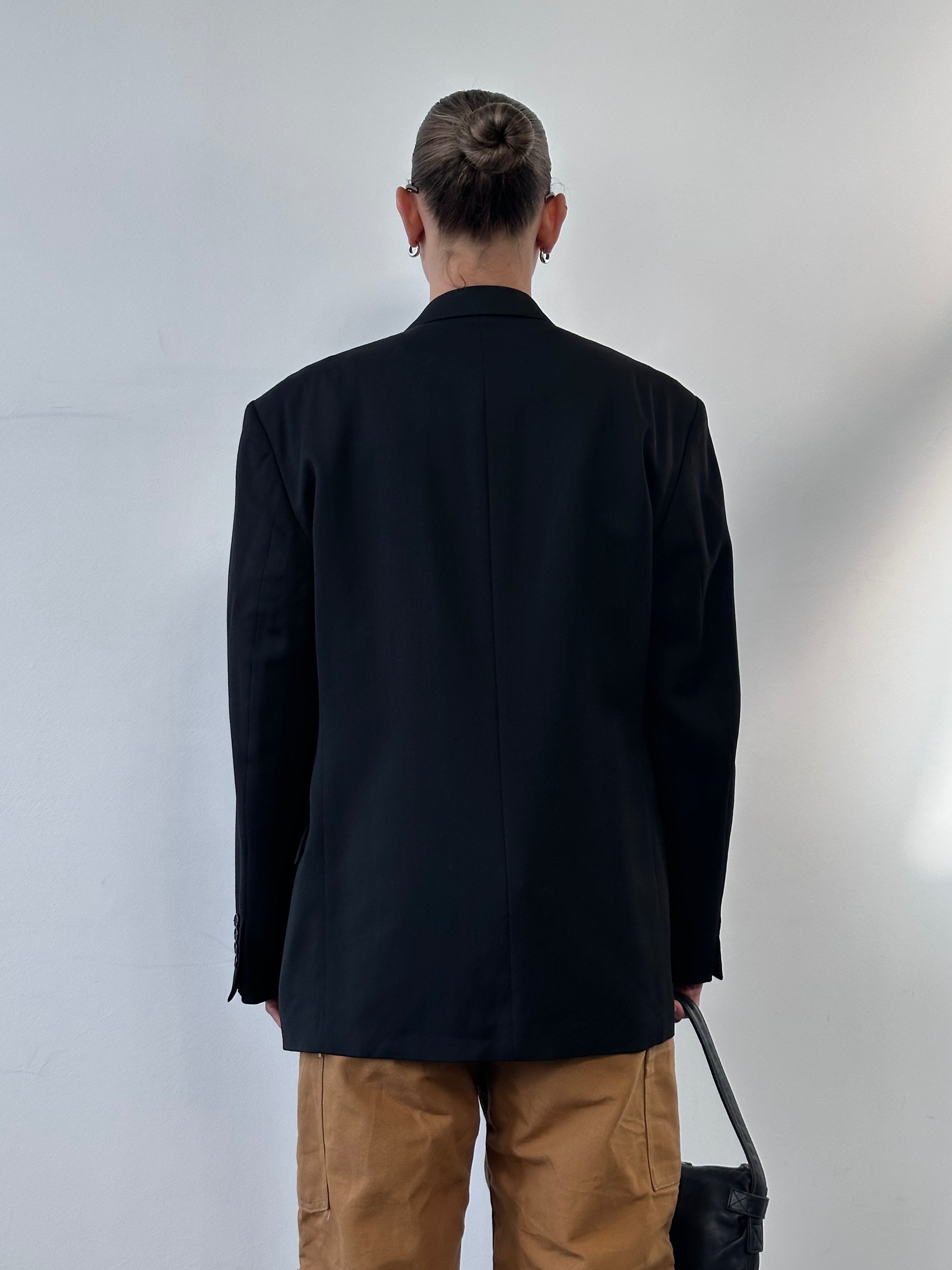 Yves Saint Laurent men's pure wool single-breasted blazer in size 42R/XL, tailored fit with classic lapel and button closure.