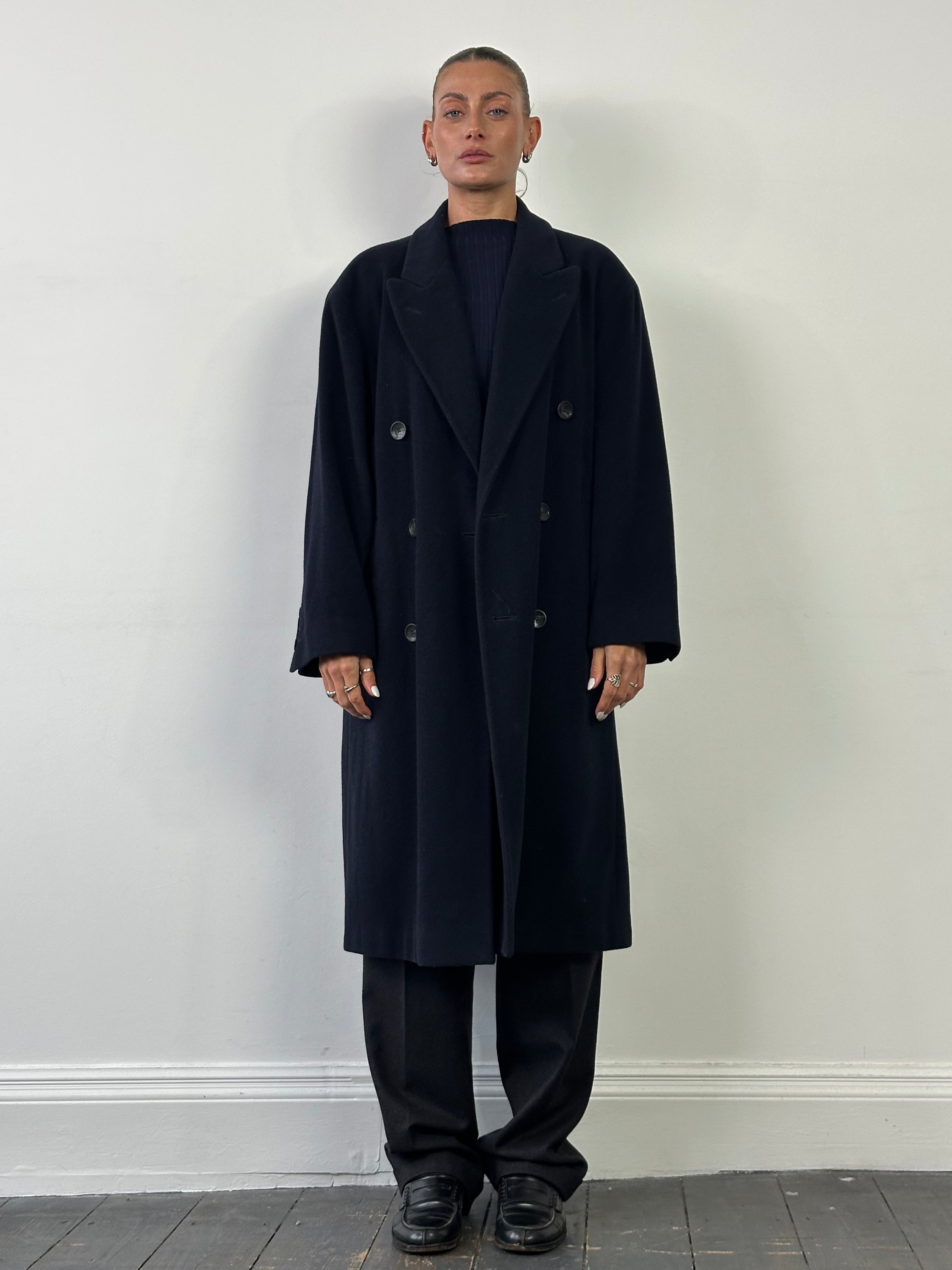 Vintage wool cashmere double-breasted coat in XL with classic design and tailored fit, showcasing warm, textured fabric and stylish lapels.