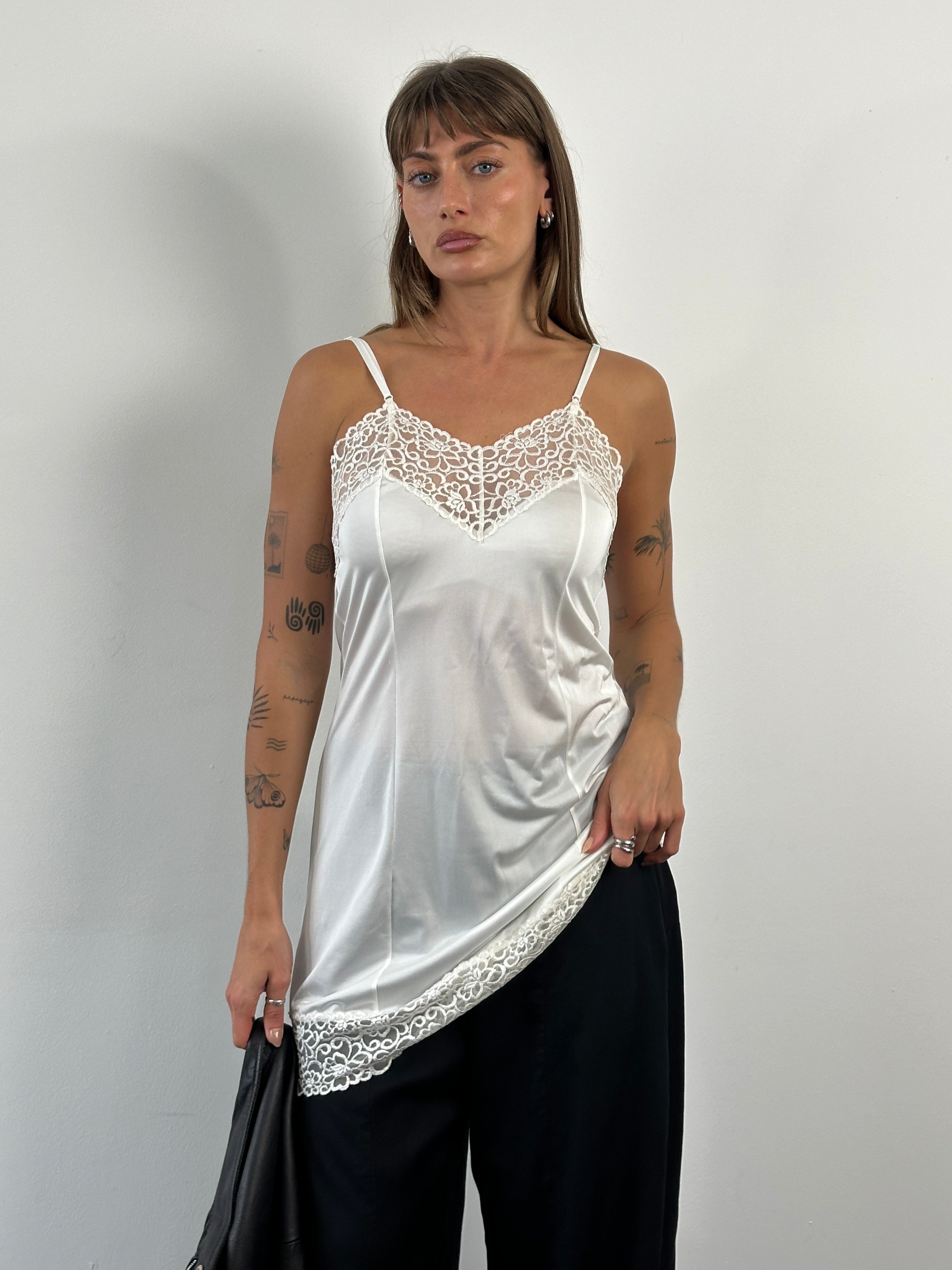 Vintage 1990s Japanese lace sheer mini slip dress, size small, featuring delicate lace details and a classic vintage style.