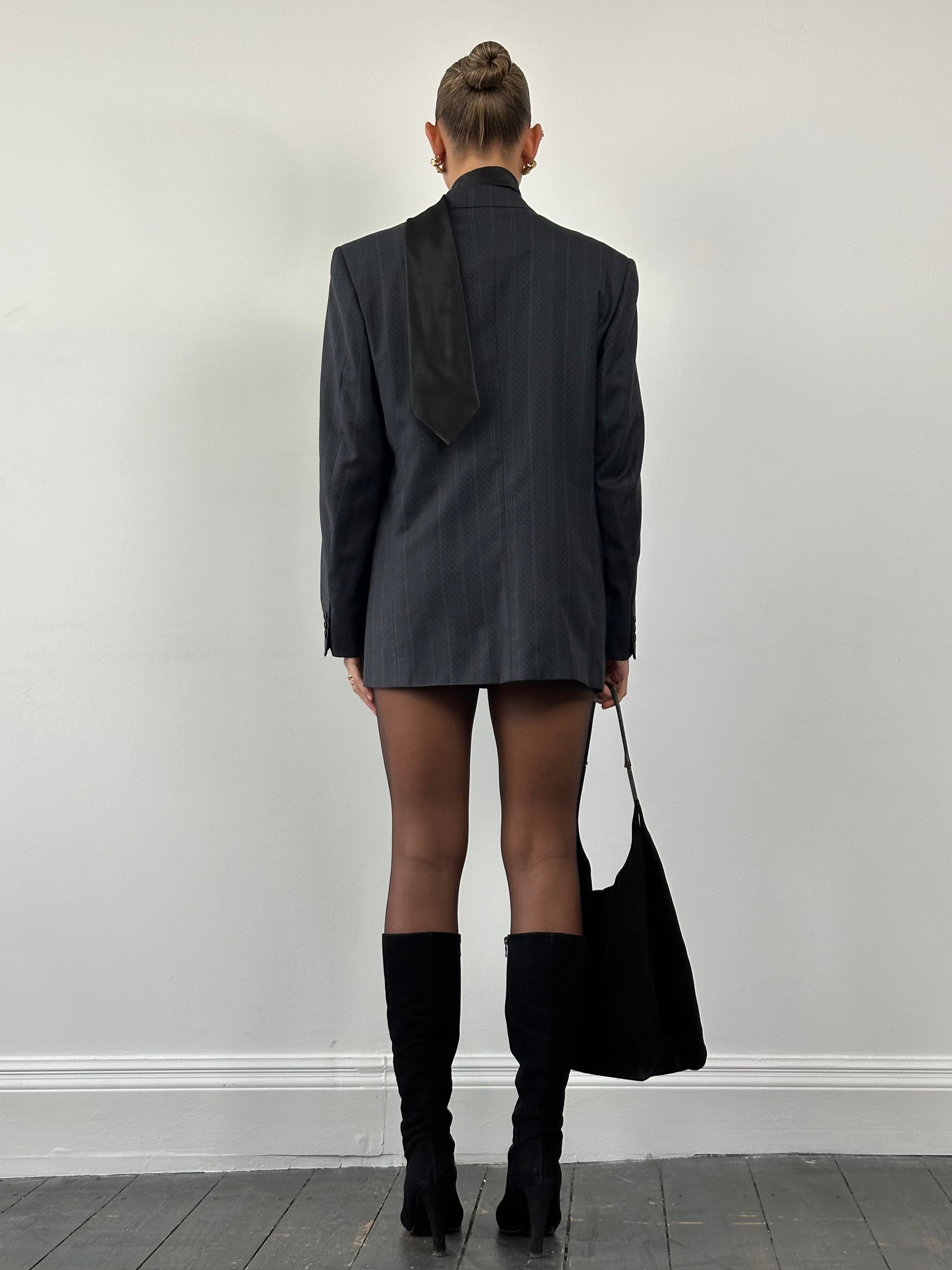 Christian Dior wool silk double-breasted print blazer in size 40R/L, featuring a tailored fit and elegant design.