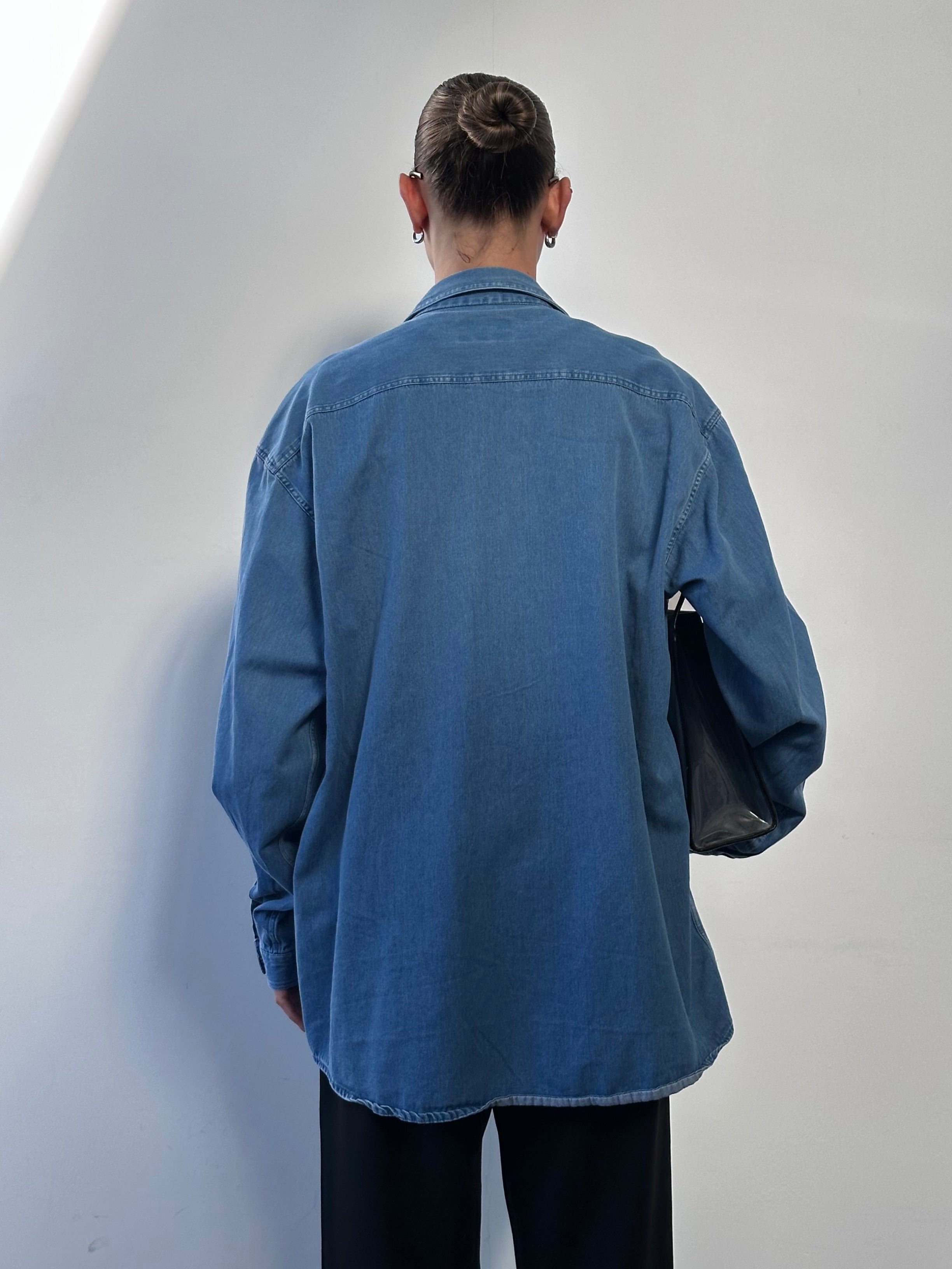 Armani Jeans pure cotton denim shirt in XL, button-up style with classic collar and long sleeves, shown on a hanger.