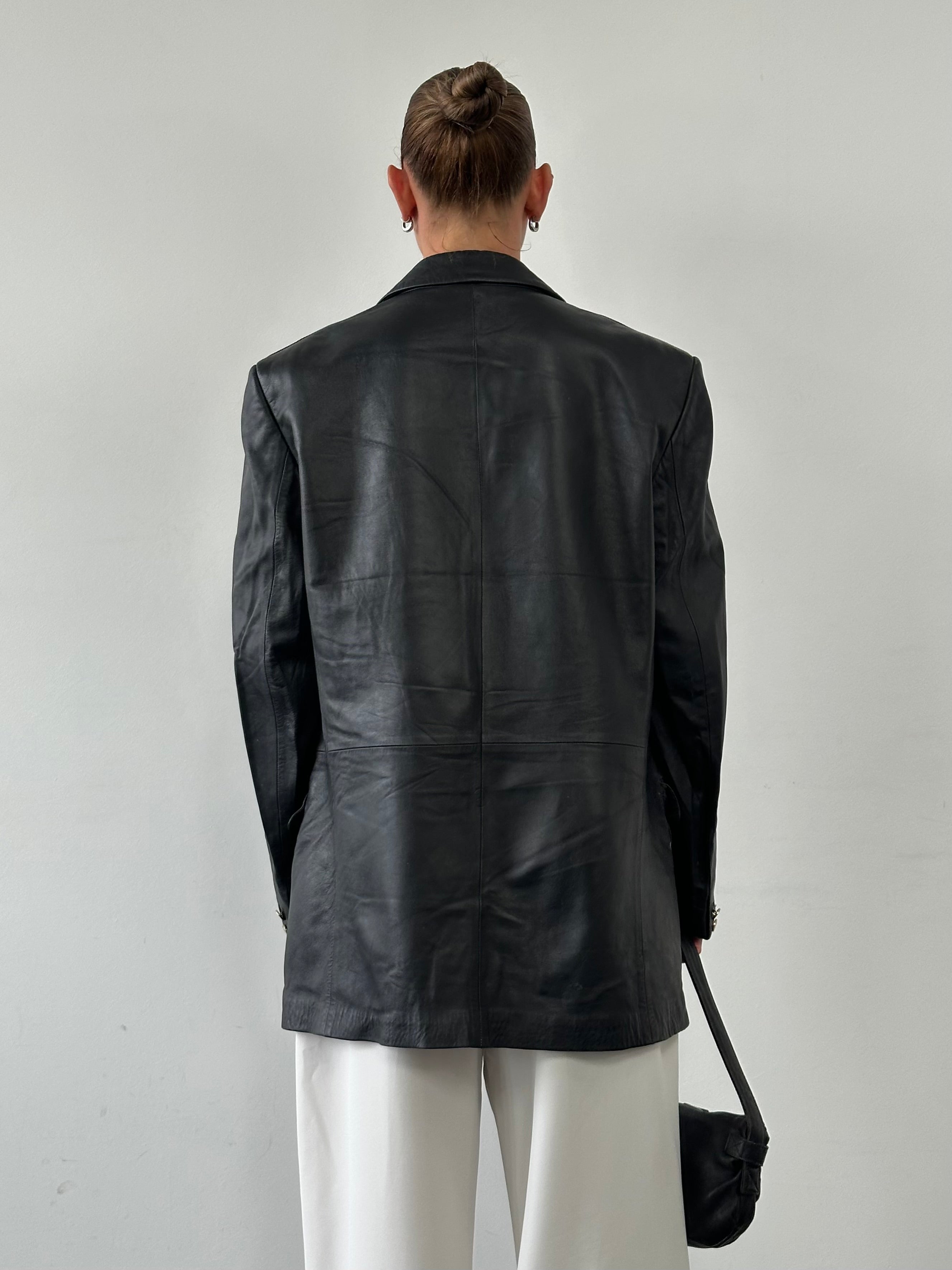 Versace Jeans Couture bespoke leather blazer jacket in XL, featuring a tailored design and button details, shown on a hanger.