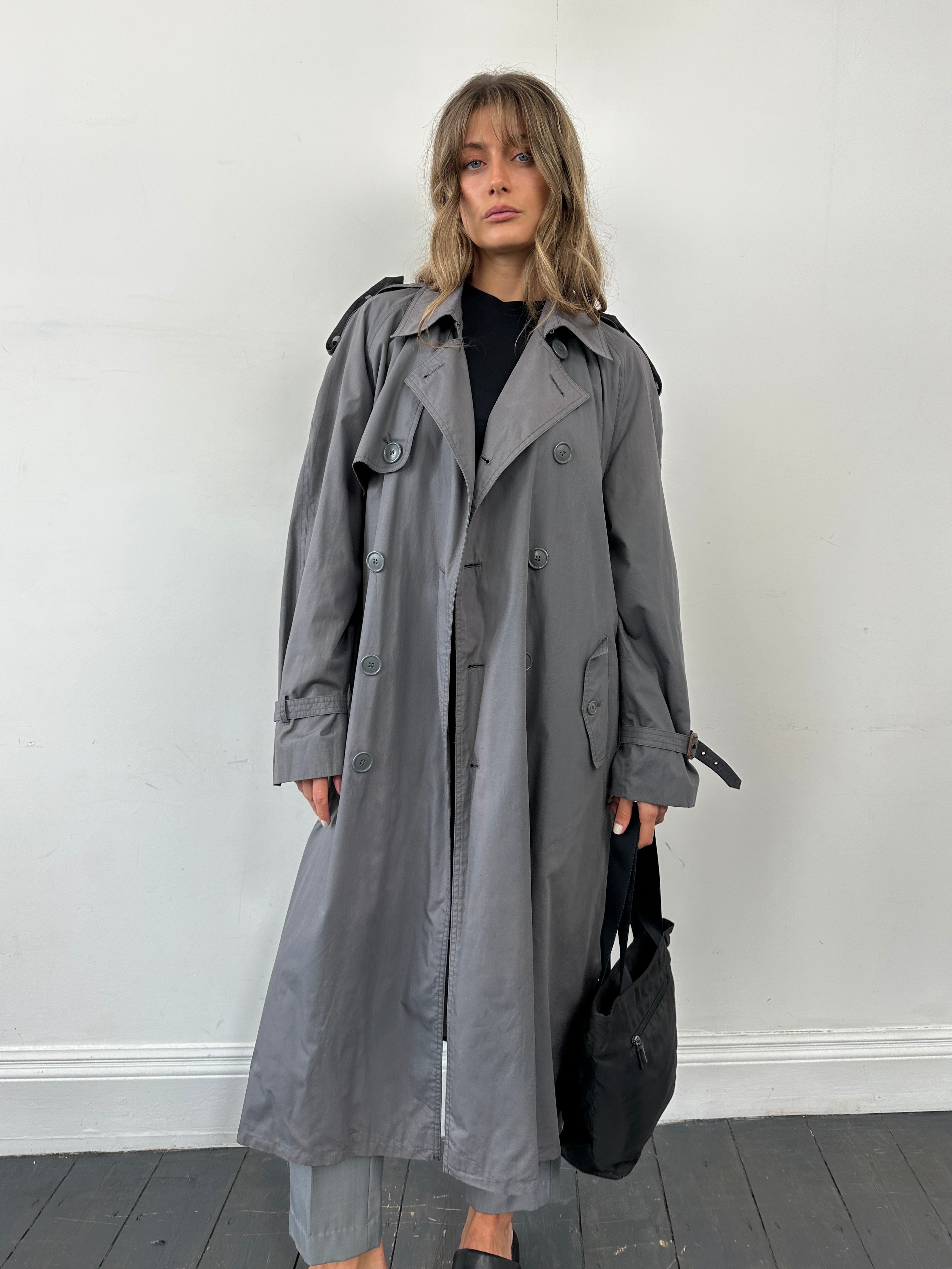 Yves Saint Laurent Pour Homme double-breasted belted trench coat in XL/XXL, showcasing classic design and stylish fit.