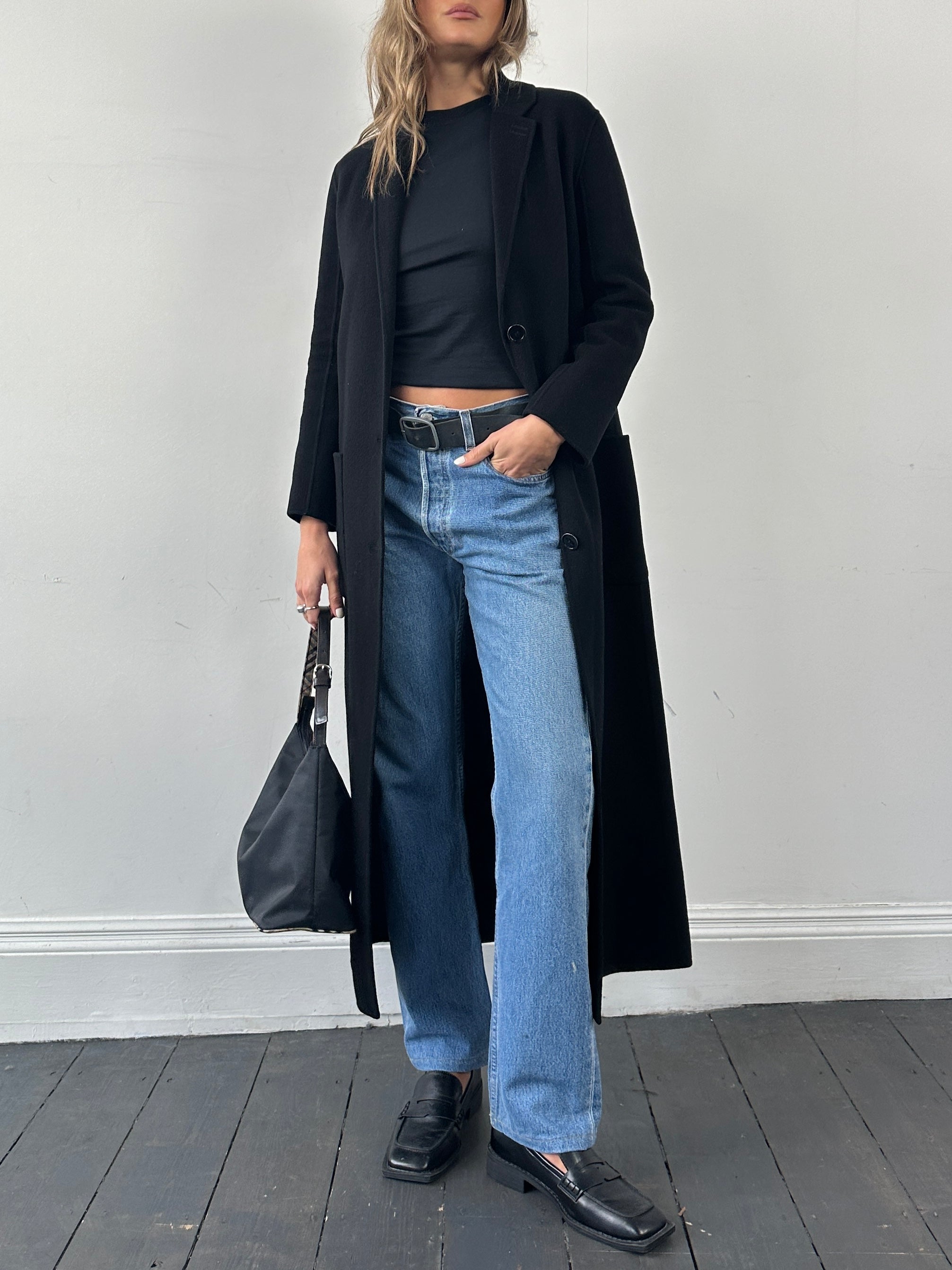 The Kooples double-faced pure wool unlined coat in XS/S, floor-length, showcasing a sleek, tailored design and neutral color.