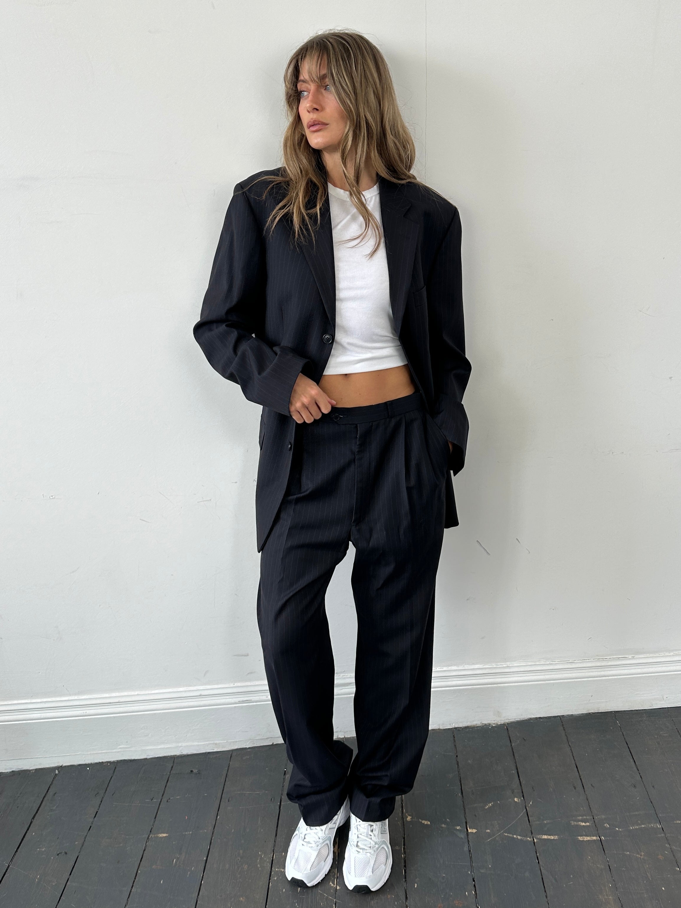 Balmain pinstripe pure wool jumpsuit with single-breasted design, tailored fit, and classic suit styling in a 40L/W32 size.