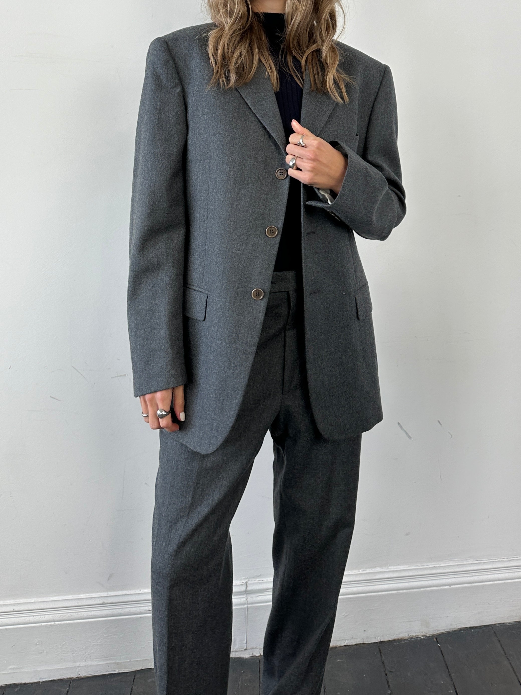 Missoni pure wool single-breasted jumpsuit in size 42R/W32, featuring tailored fit and classic design.