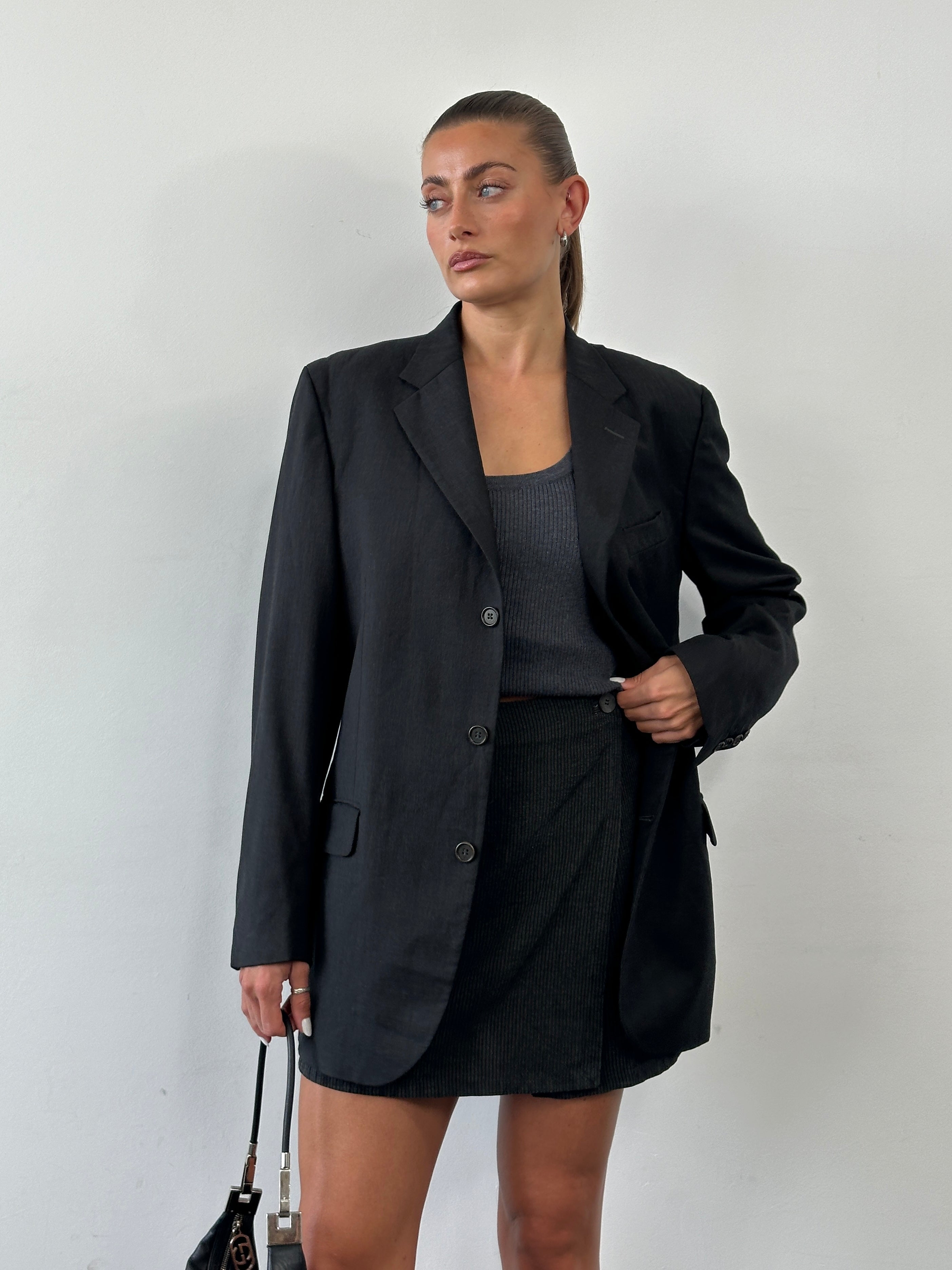 Yves Saint Laurent Pour Homme 1990s pure wool single-breasted blazer in size 40R/XL, dark tailored men's blazer with classic lapels.