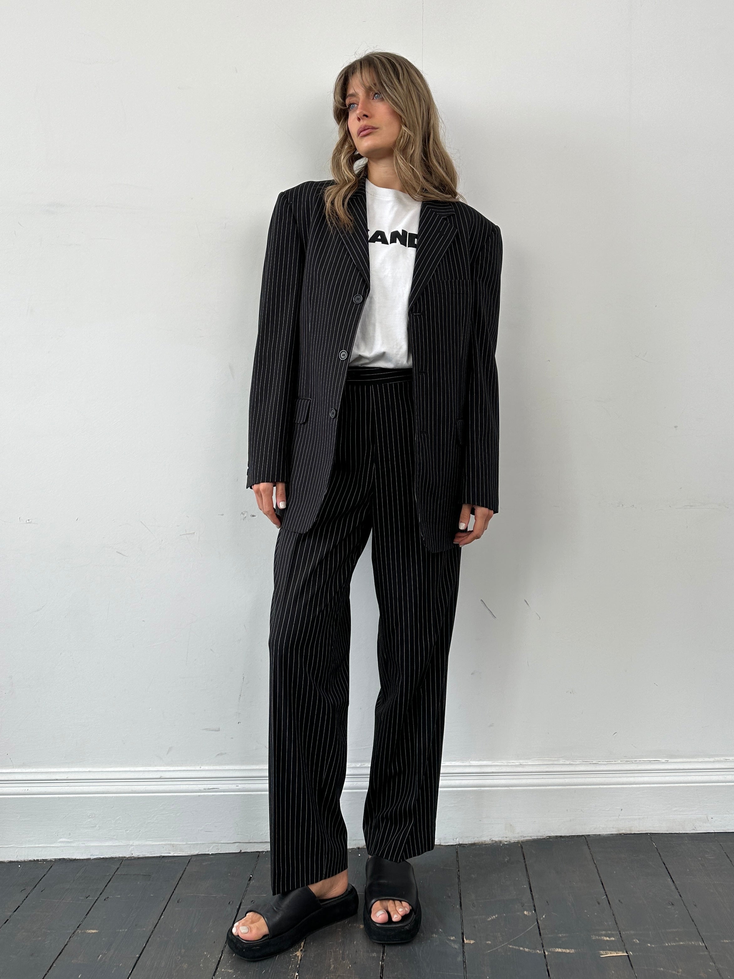 Vintage pinstripe single-breasted suit jumpsuit in size 40R/W36, featuring a classic tailored design with a vintage style.