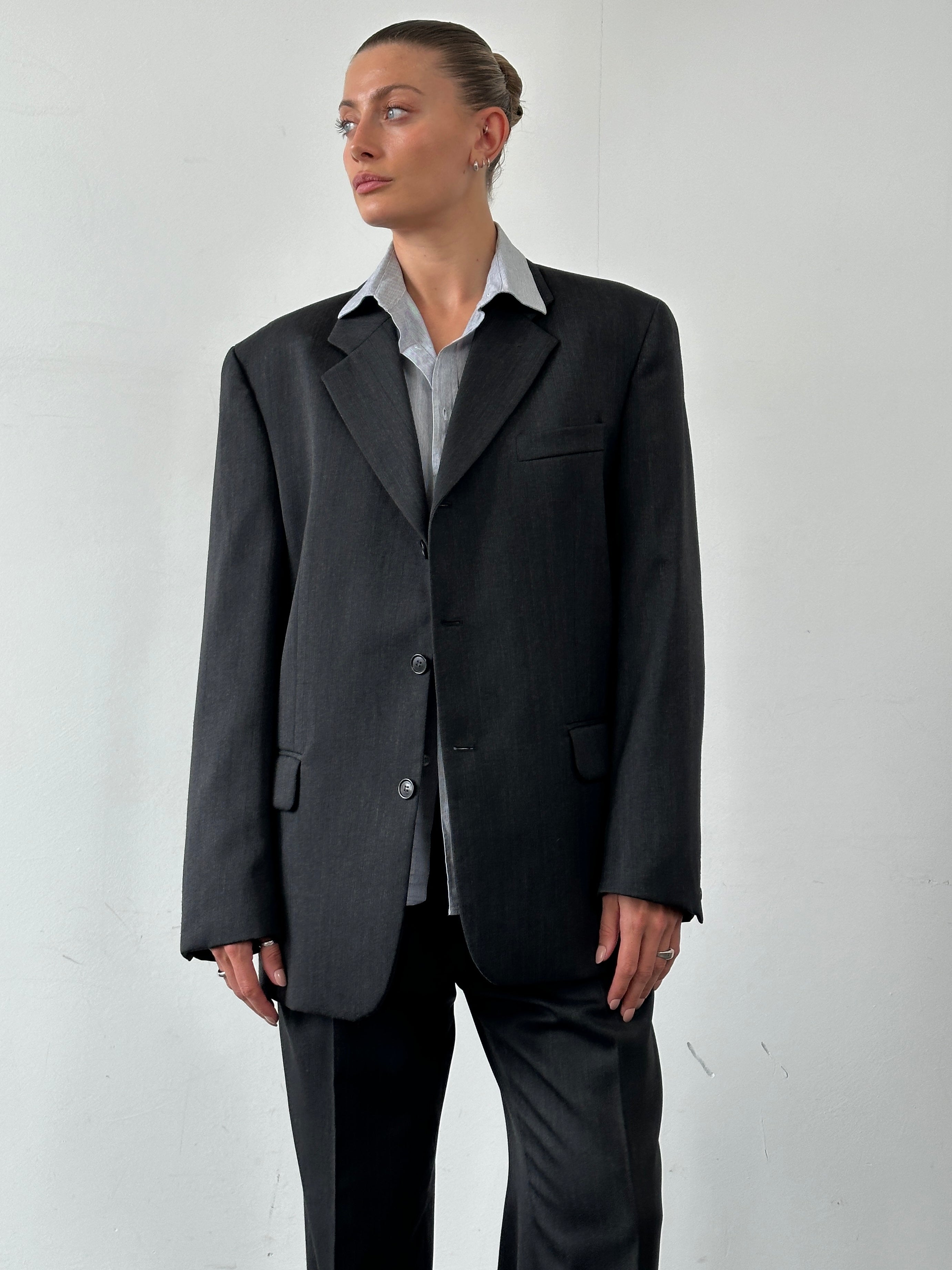 Vintage wool pinstripe single-breasted suit jumpsuit in size 40R/W32, featuring tailored lapels and classic design.