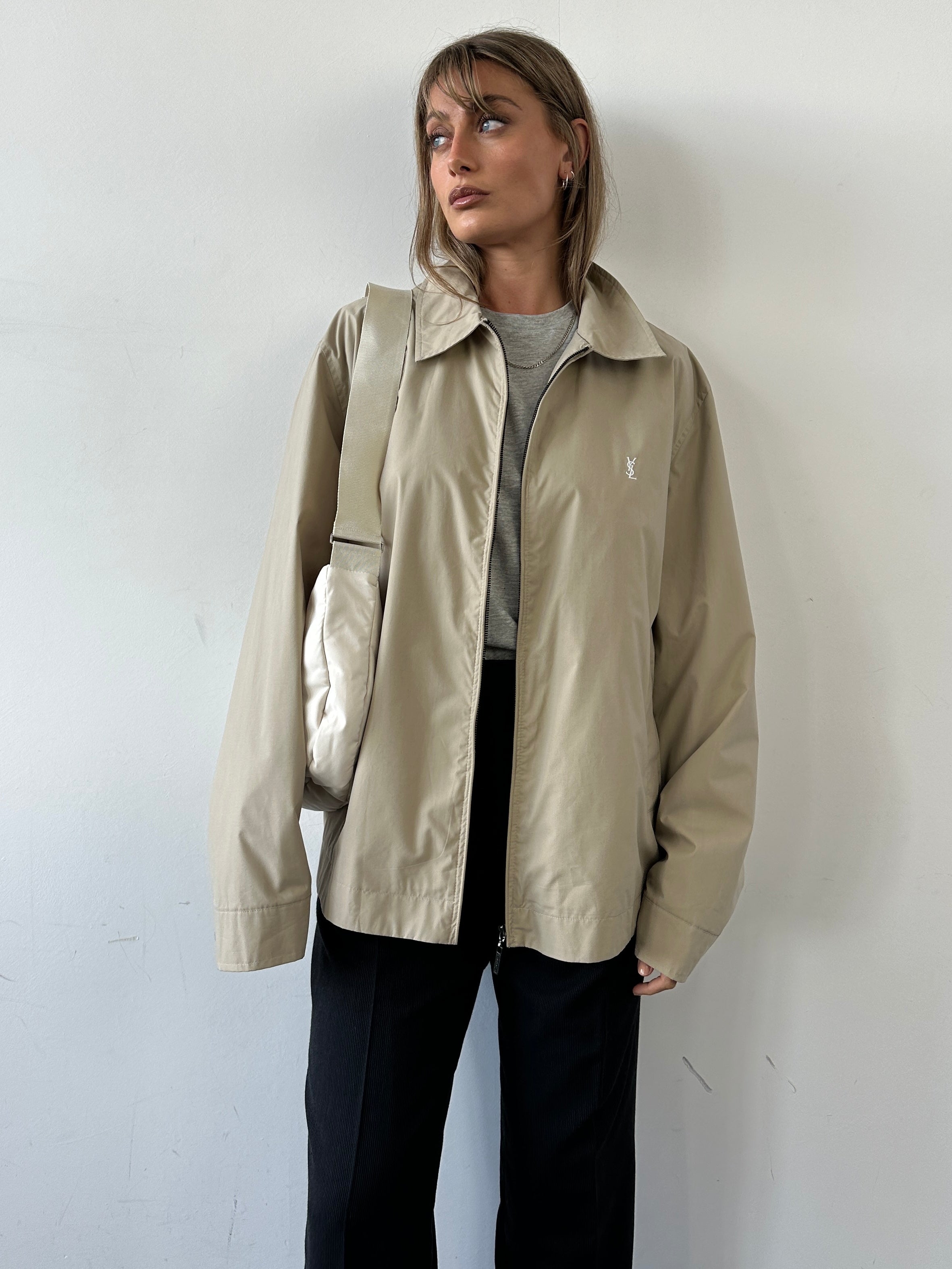 Yves Saint Laurent Harrington Logo Jacket in XL, black with YSL logo details, front view showing stylish design and fabric texture.