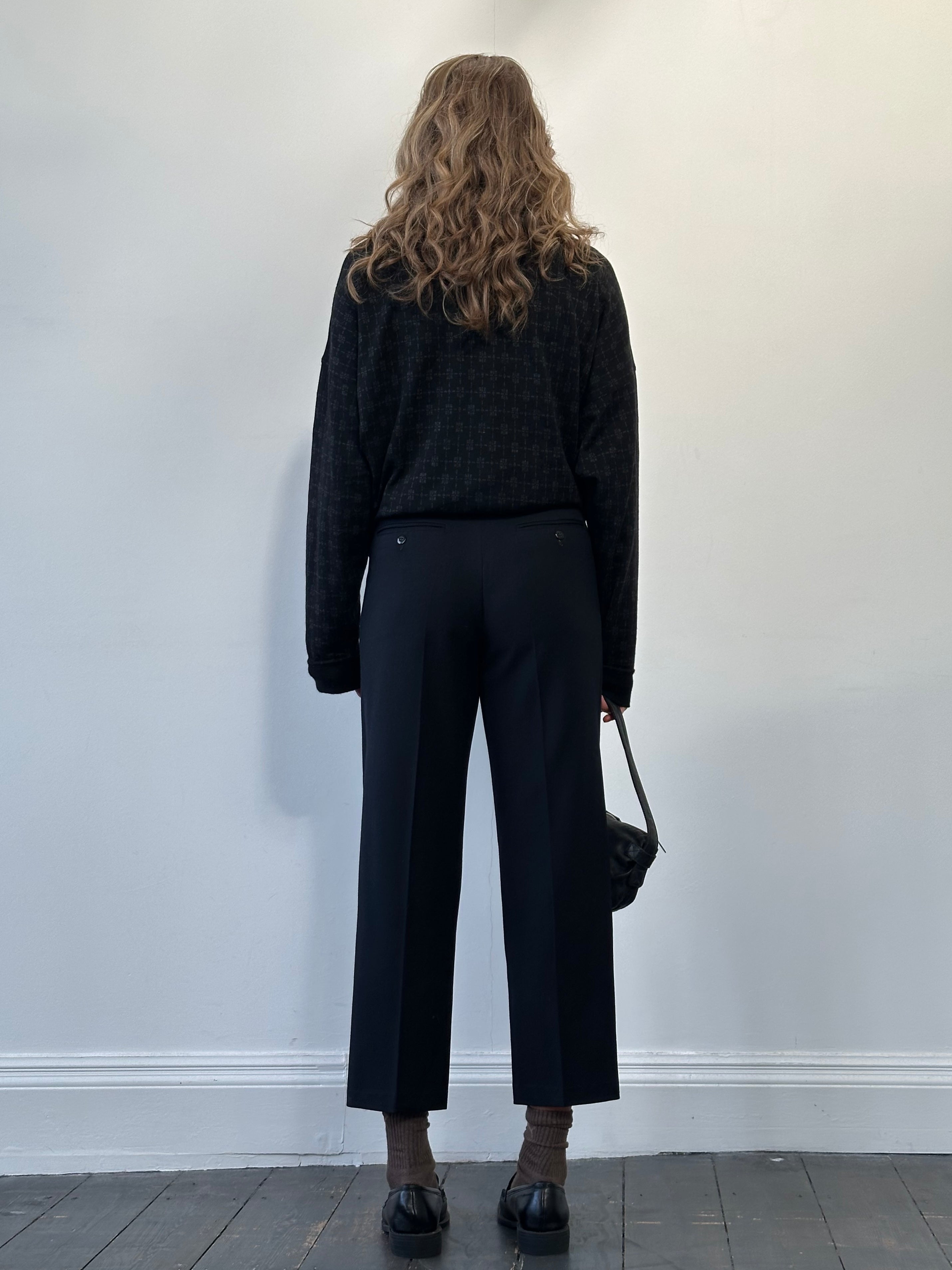 Vintage pure wool tapered leg tailored trousers in size W28, featuring a classic fit and clean tailoring.