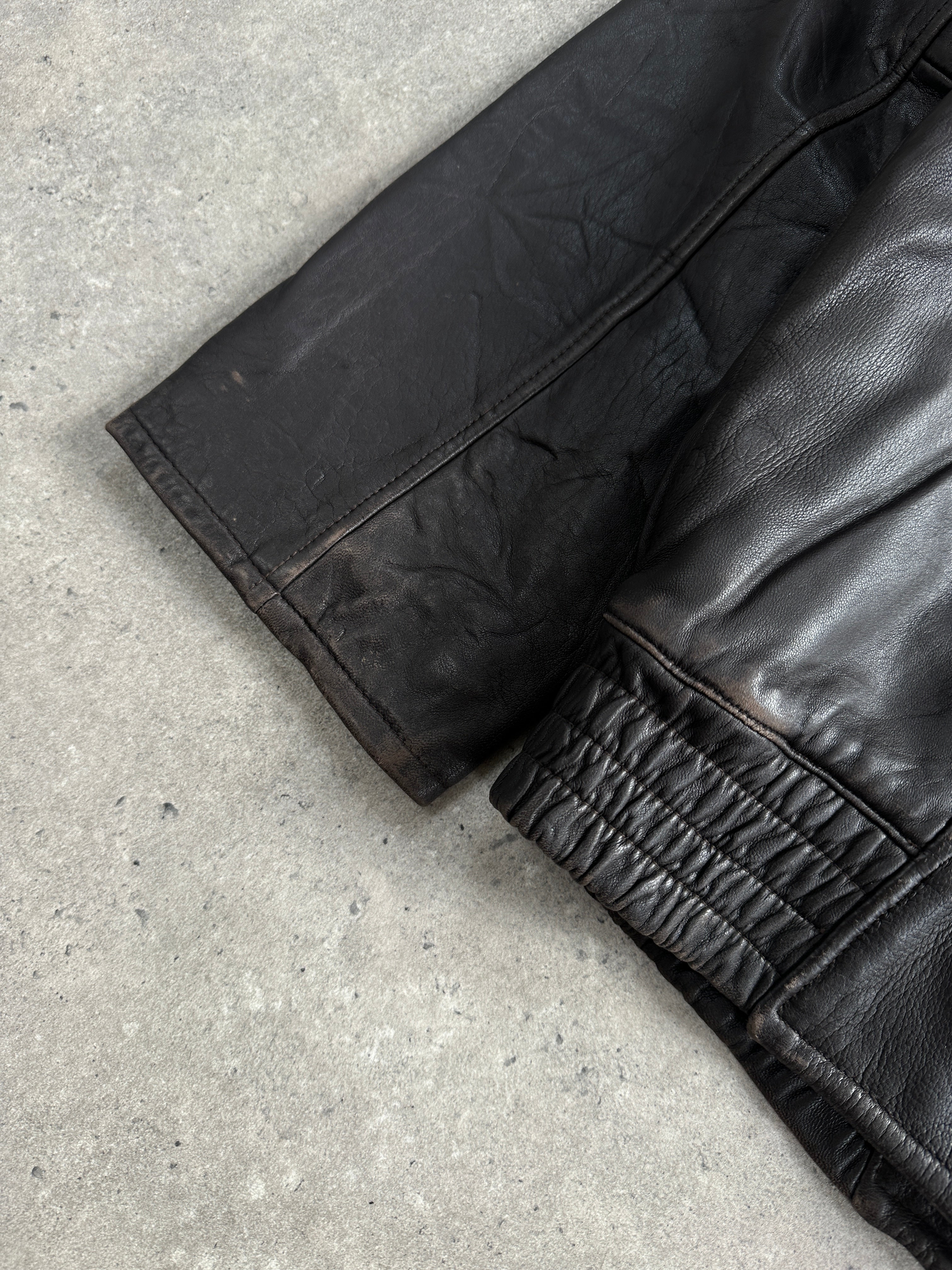 London Fog distressed leather jacket in size L, showcasing a rugged 1990s-inspired design with textured leather and classic style.