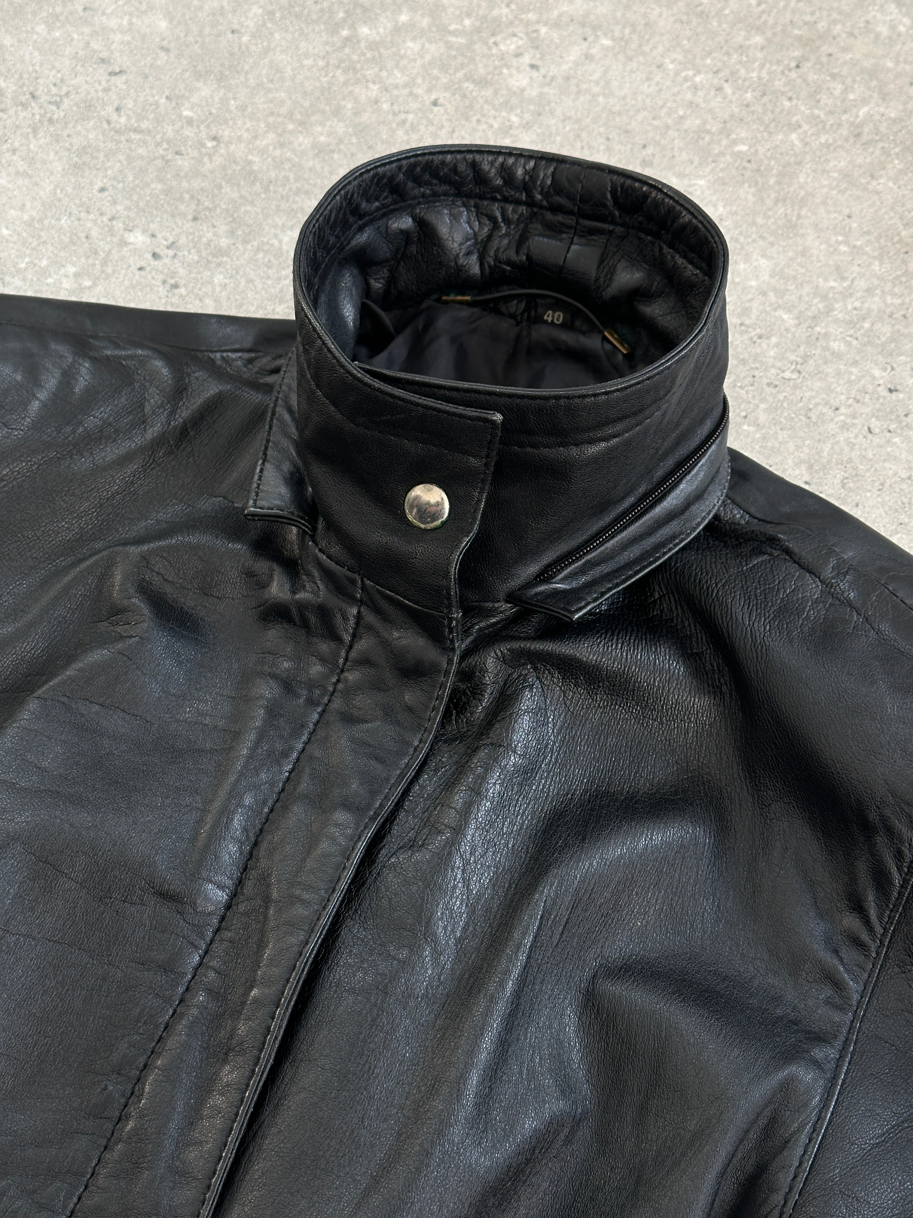 Vintage high neck leather jacket with removable hood, stylish M/L size, featuring classic design and smooth leather texture.