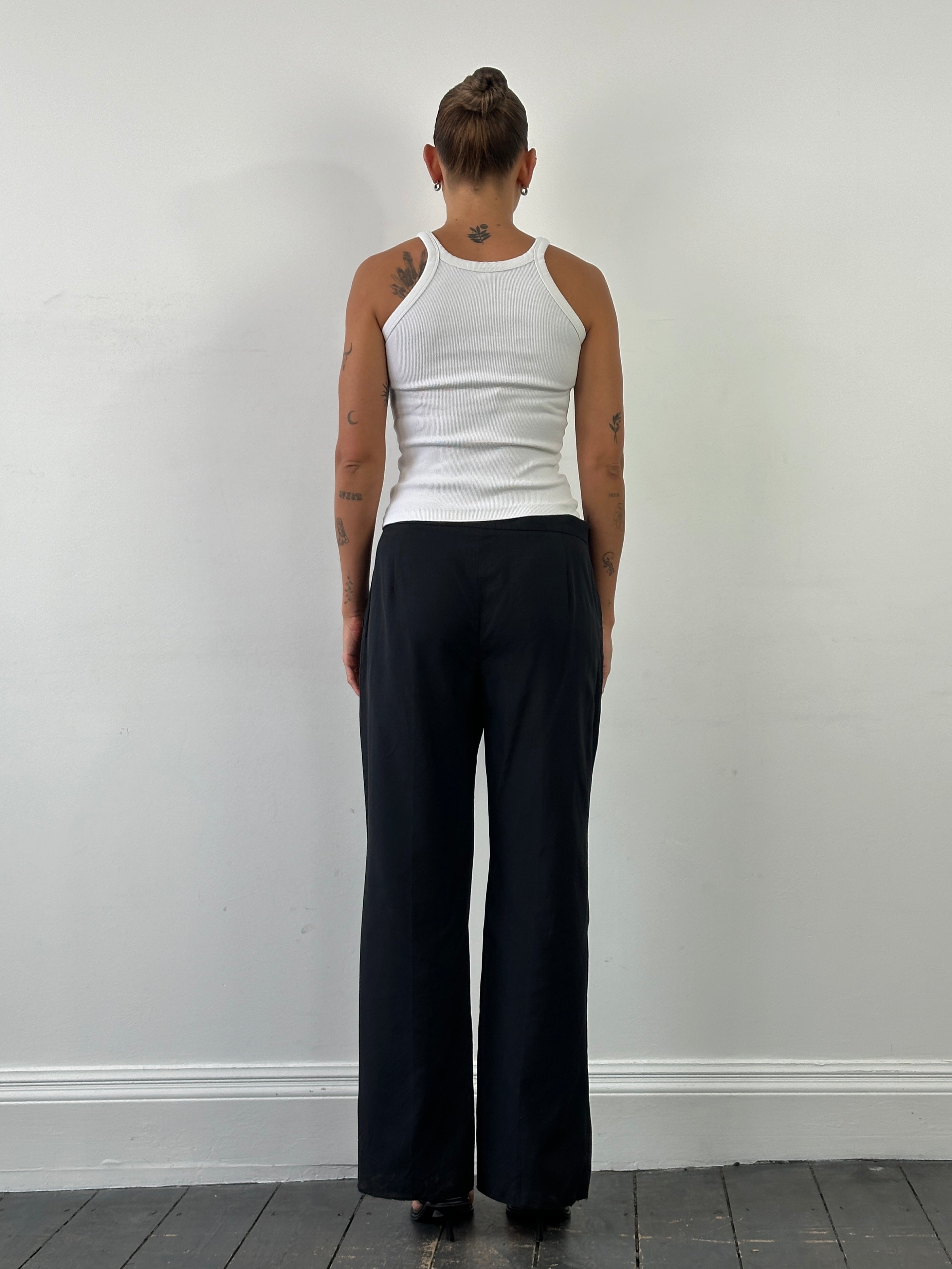 Max Mara cotton silk mid-waisted straight-leg trousers in neutral color, displayed on a hanger.