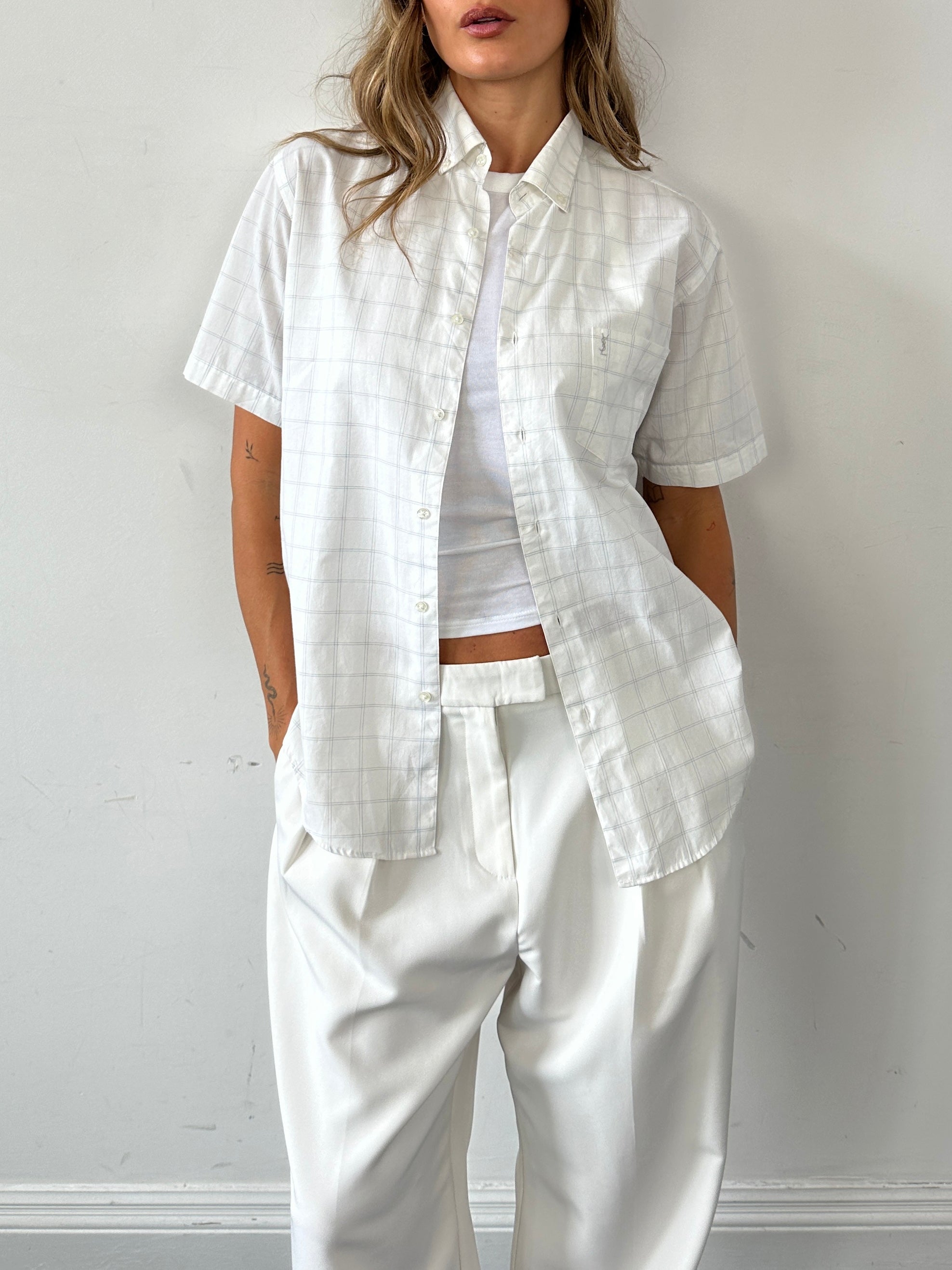 Yves Saint Laurent cotton check logo shirt in size M, featuring a classic check pattern and the iconic YSL logo on the chest.