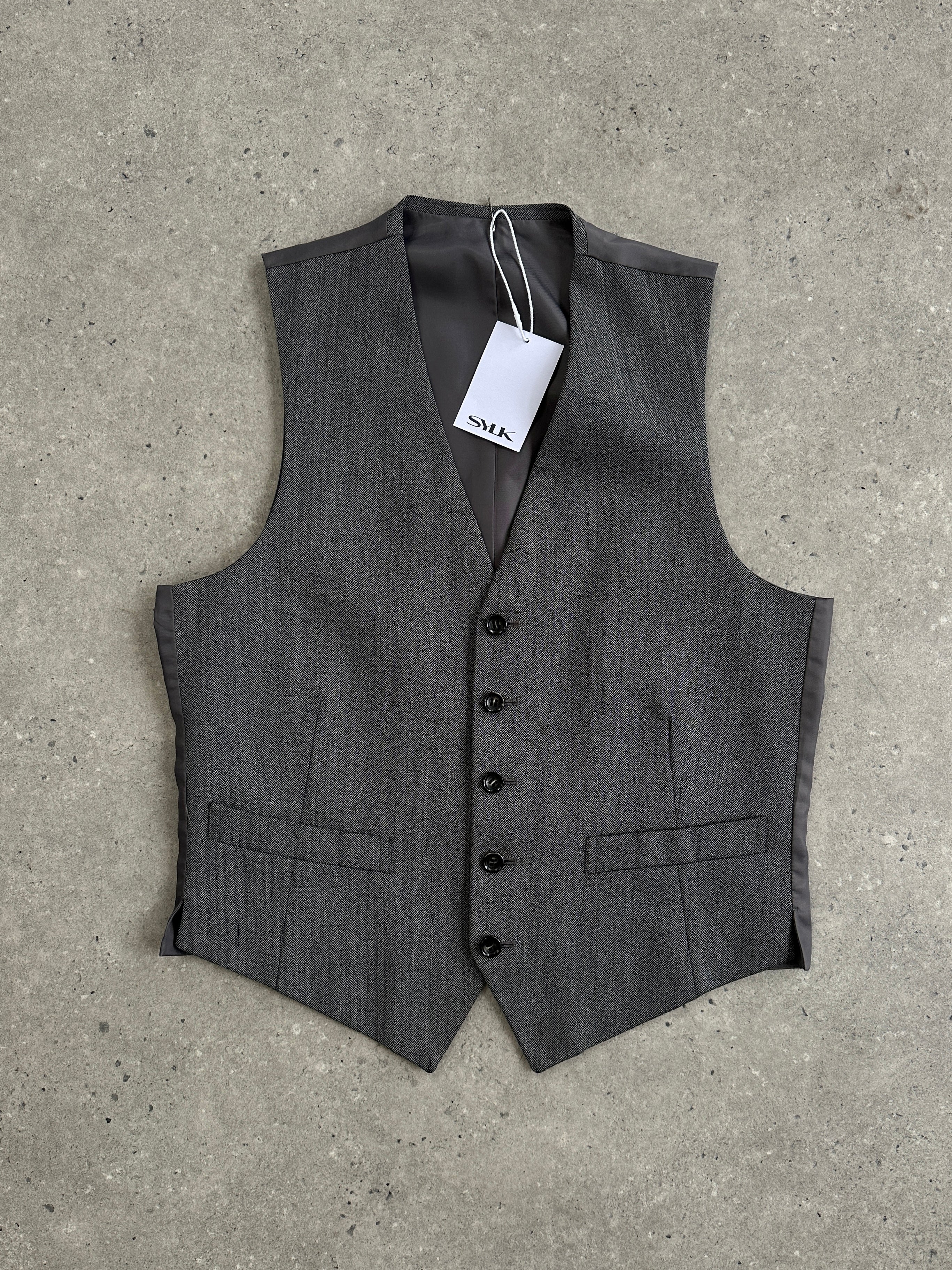 Vintage brand vintage herringbone tailored waistcoat in size M, showcasing a classic smart-casual men's vest with detailed stitching.
