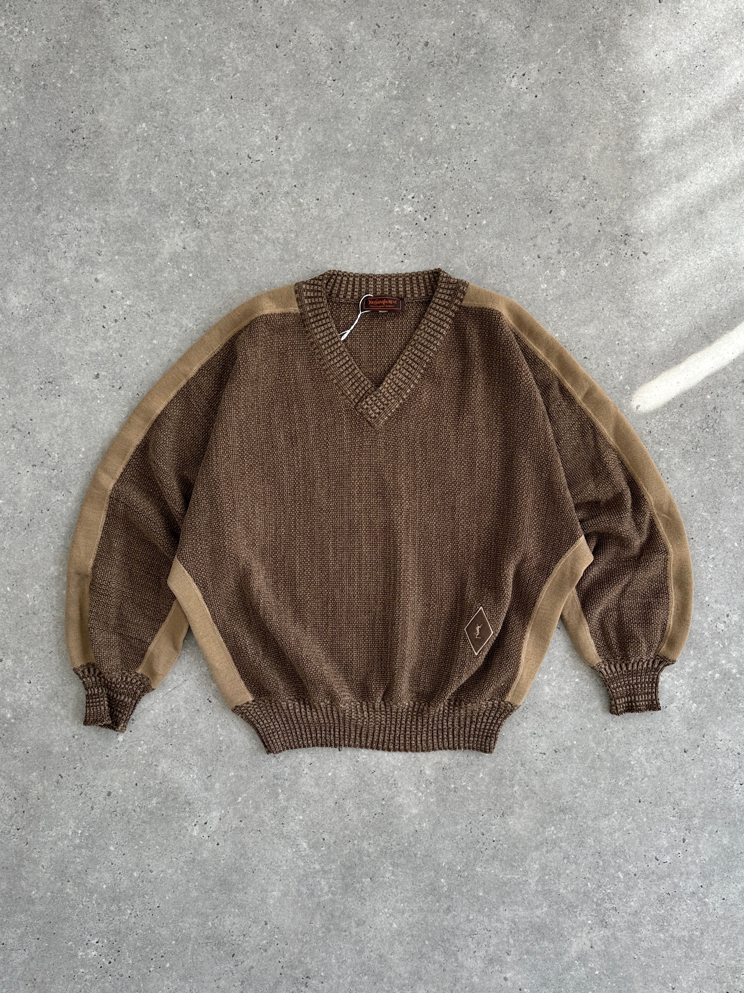 Yves Saint Laurent 80s pure wool V-neck jumper in size M/L, featuring a classic knit pattern and soft wool texture.