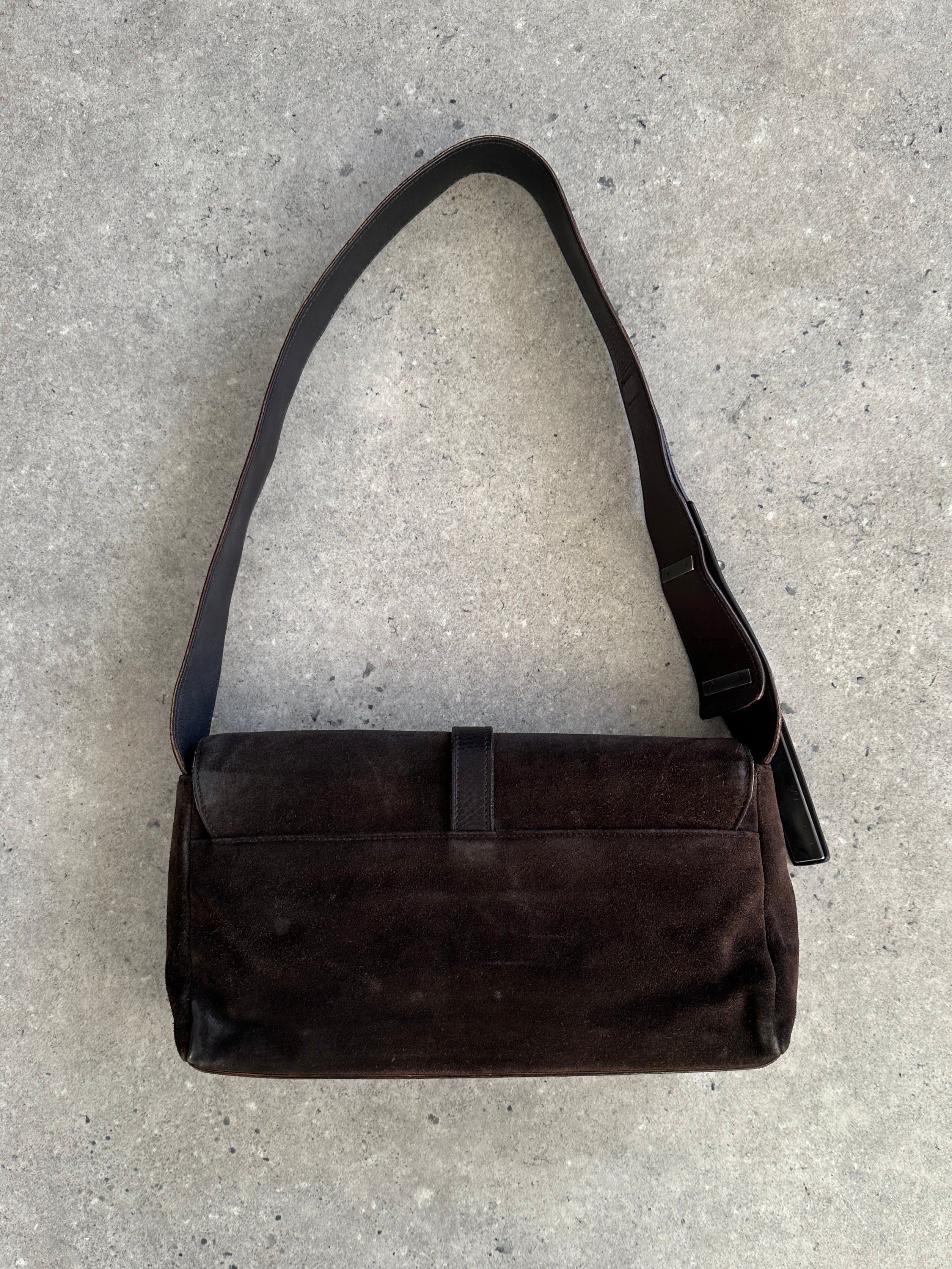Yves Saint Laurent Rive Gauche suede shoulder bag featuring a classic design with a structured silhouette and gold-tone hardware.