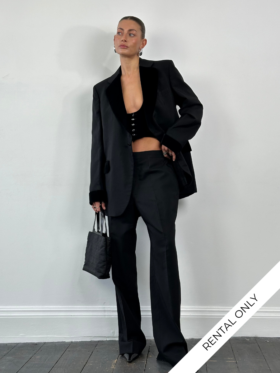 Christian Dior Monsieur 1990s velvet three-piece tuxedo suit, size 44L/W30, shown hanging with lapels and tailored fit.