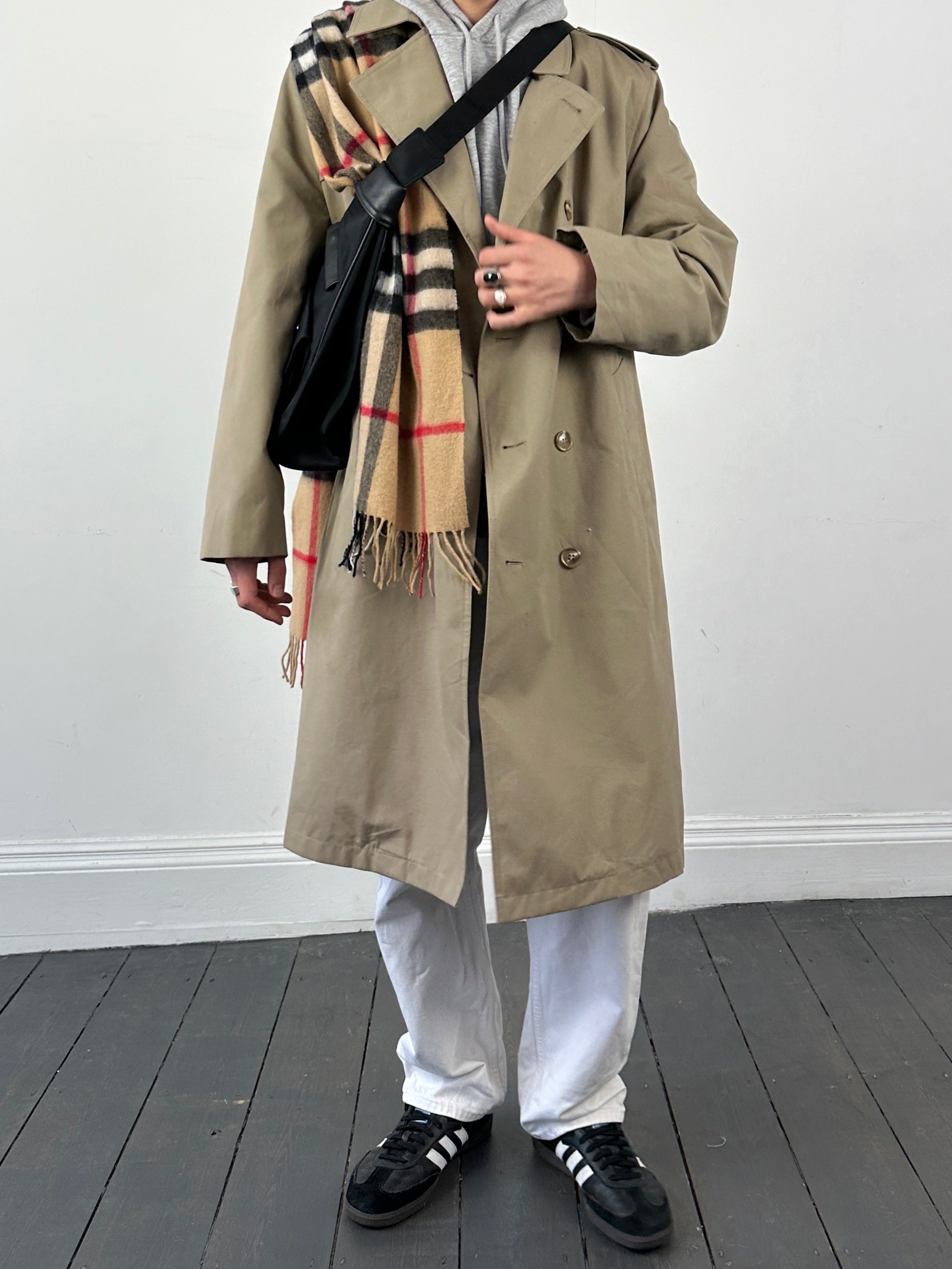 Vintage double-breasted fleece-lined trench coat in XL, showcasing classic style with warm, cozy fabric and timeless design.