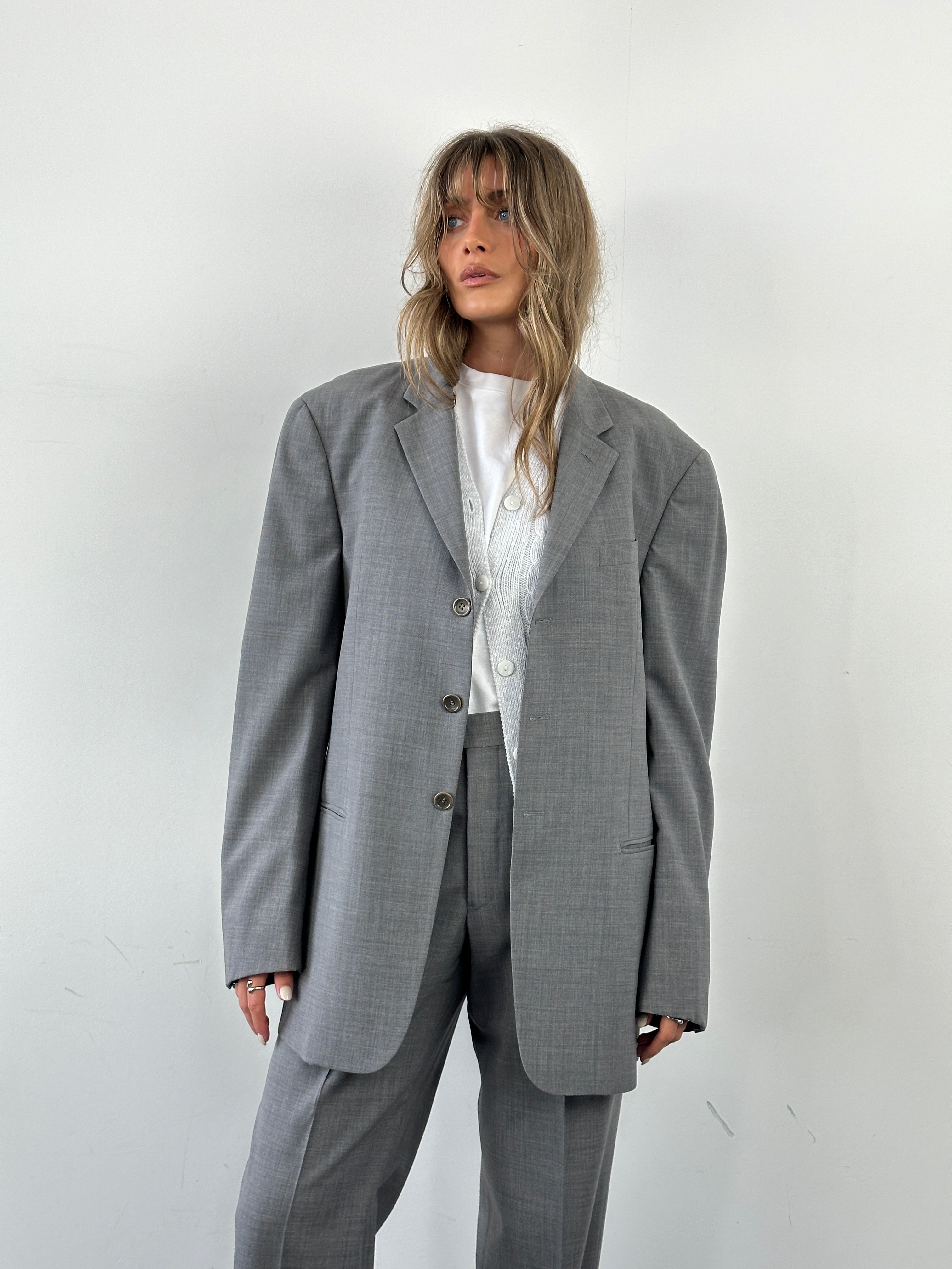 Armani Collezioni virgin wool suit jumpsuit in beige, relaxed fit, single-breasted design, size 40R/W32, tailored and stylish.