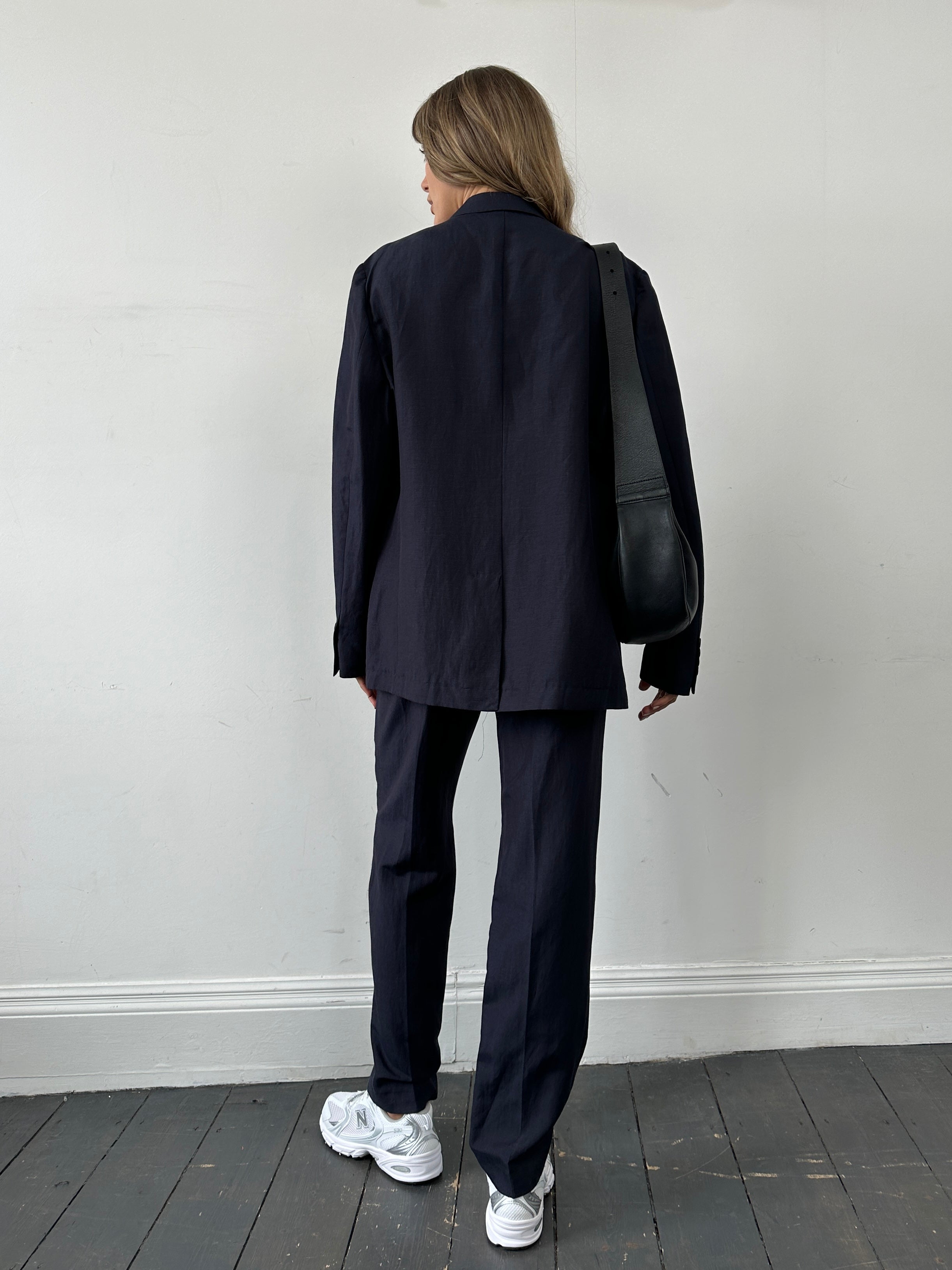 Jaeger Italian linen silk single-breasted jumpsuit in size 44R/W33, featuring a tailored fit and elegant fabric blend.