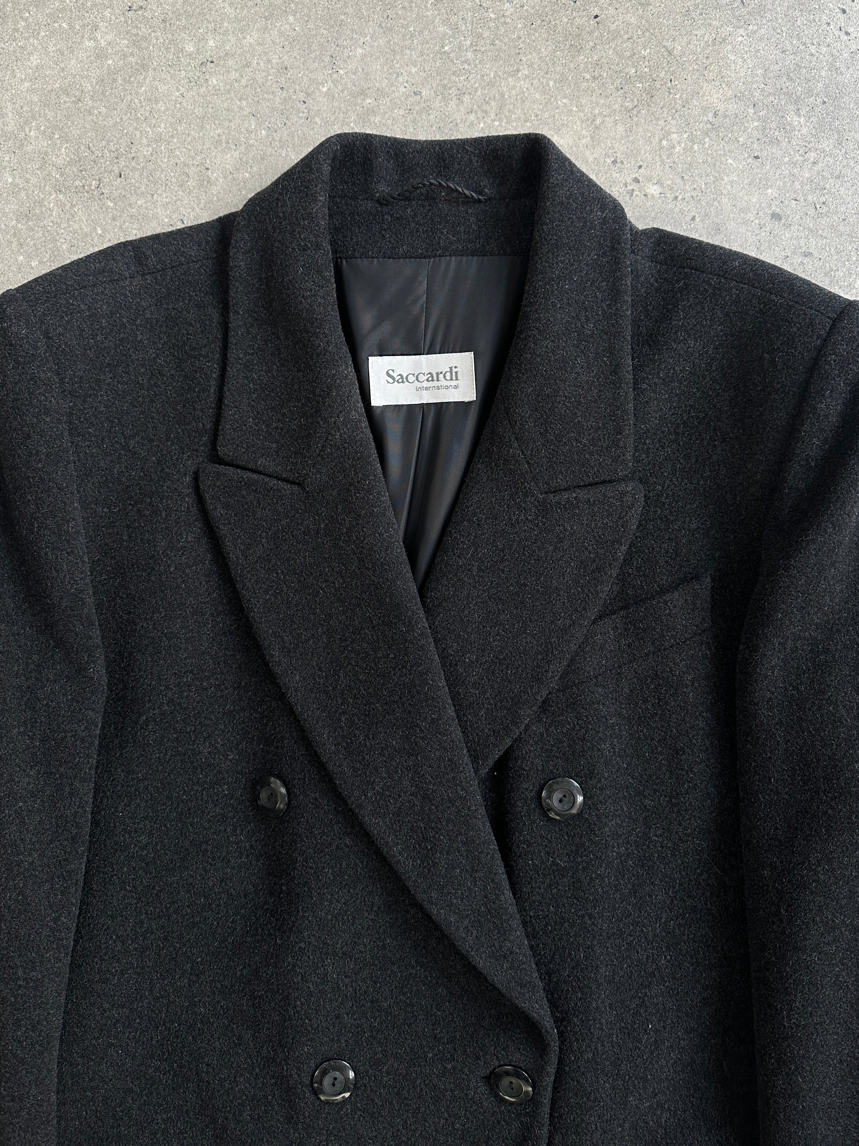 Vintage Italian 1980s double-breasted wool coat in XL, classic design with structured collar and button details, retro fashion style.