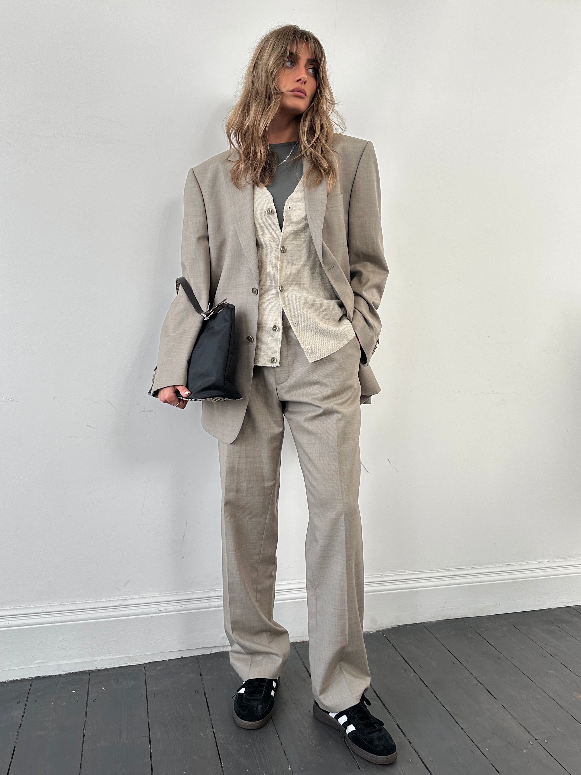 Balmain Homme wool silk single-breasted jumpsuit in size 42R/W34, featuring tailored fit and elegant fabric details.
