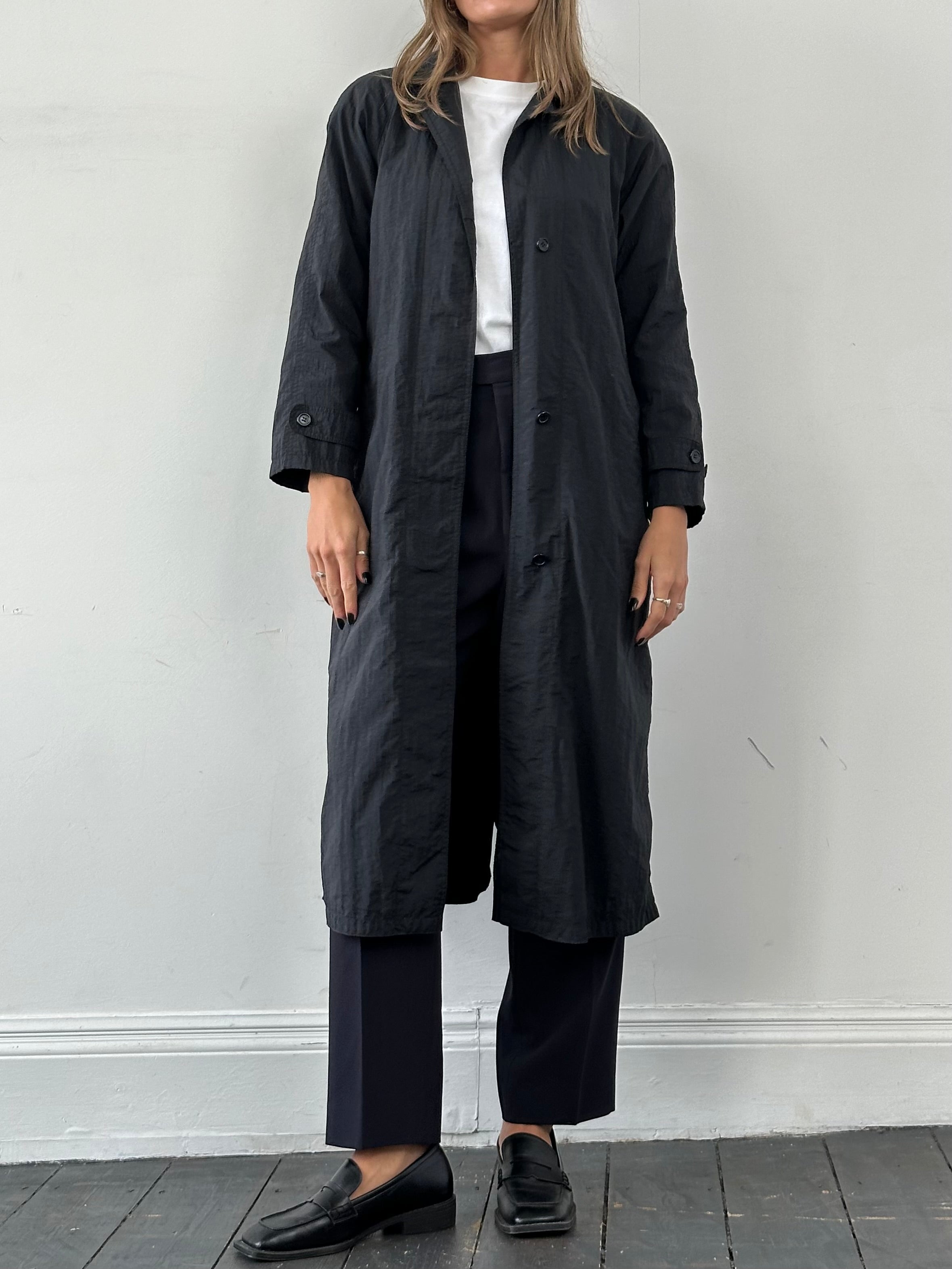 Vintage nylon trench coat with concealed placket, lightweight and stylish, in size S, featuring classic design and durable fabric.