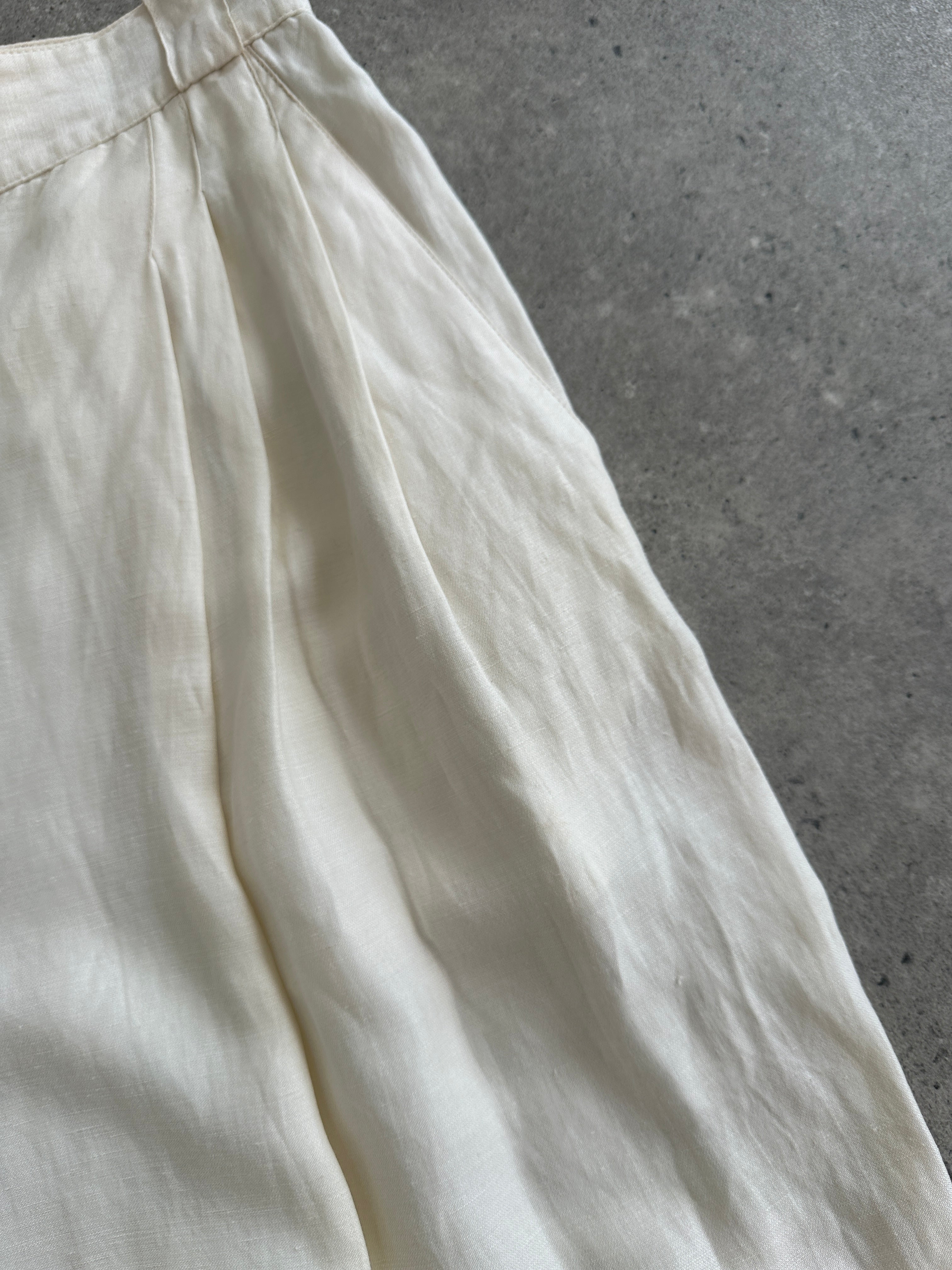 Versace 1980s silk linen high-waisted trousers, W22, with tailored fit and classic style, shown in the image.