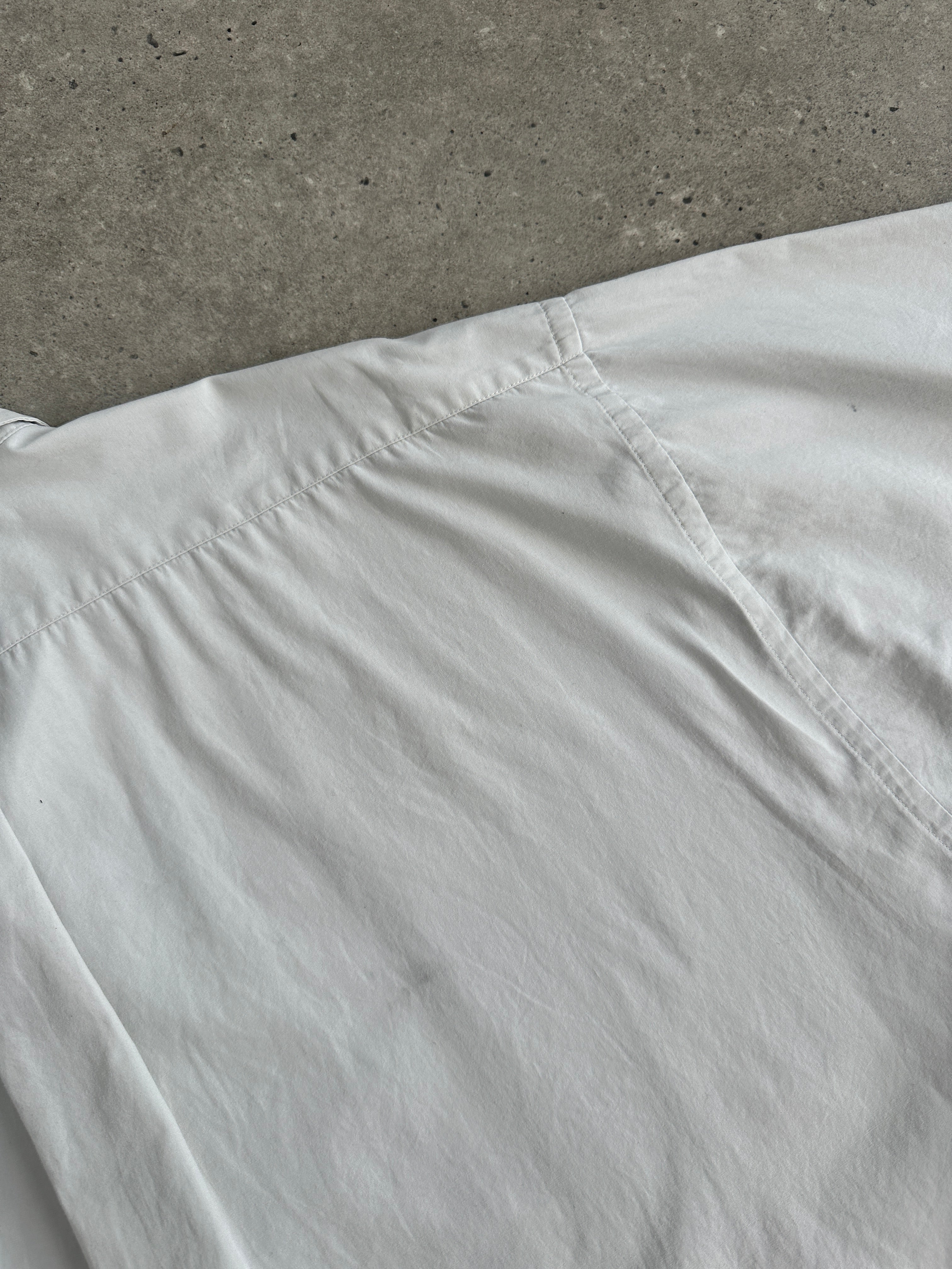 Yves Saint Laurent Pour Homme pure cotton short sleeve logo shirt in XXL, white with YSL branding on the front.