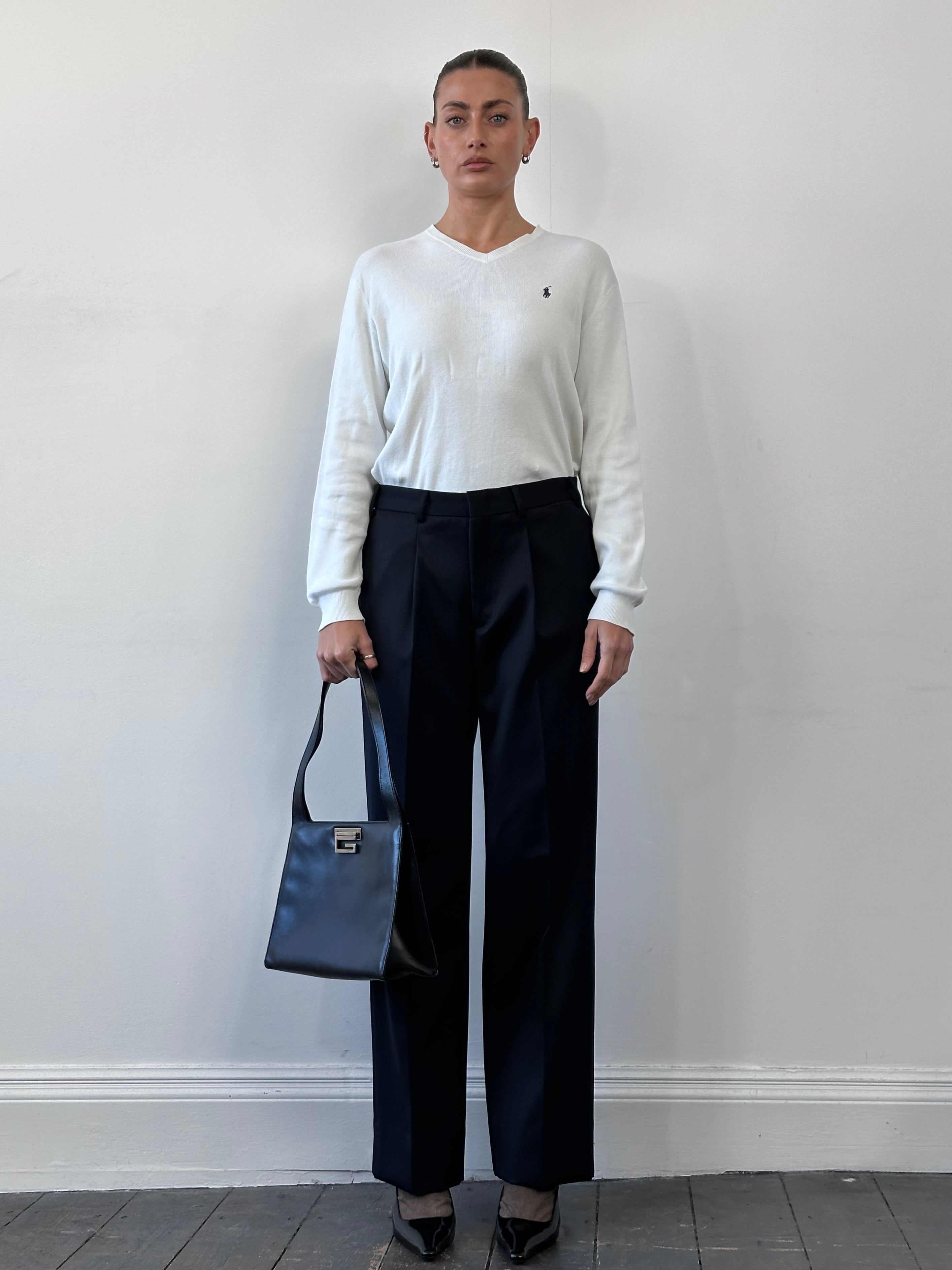 Vintage Italian pure wool tailored trousers in size W32, featuring a classic fit and traditional design.
