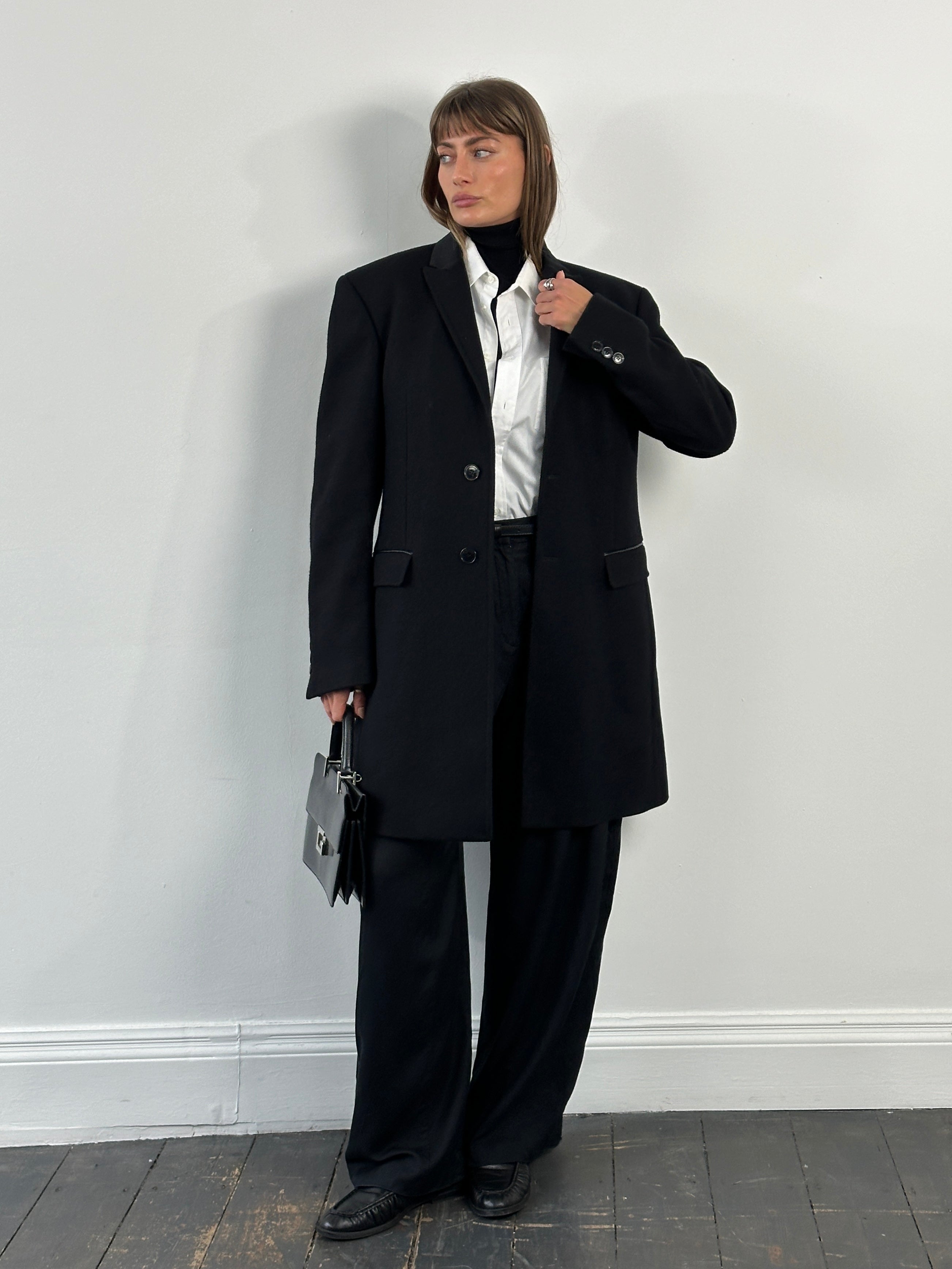 Versace Collection wool single-breasted coat in size L/XL, stylish and tailored with classic lapel and button closure.