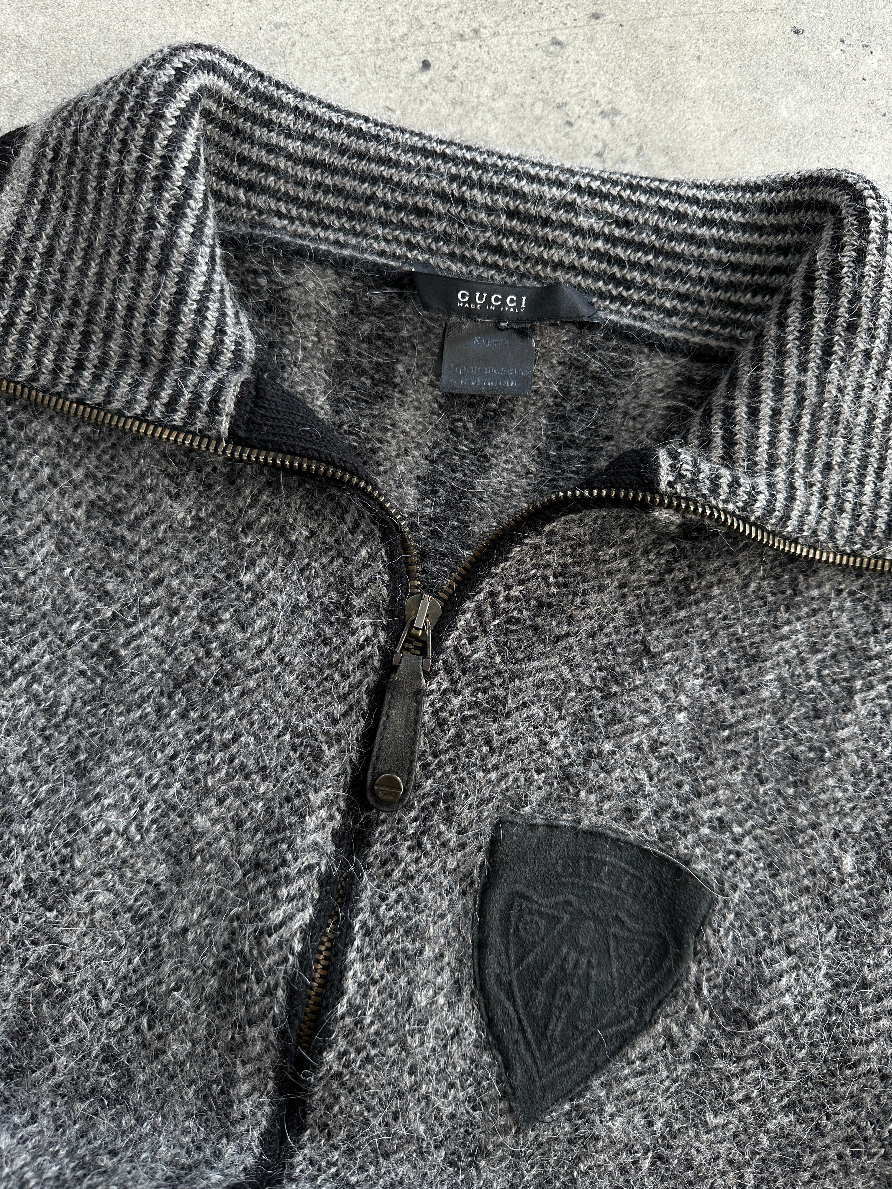 Gucci wool mohair cardigan with logo patch in size S, featuring a cozy knit fabric and branded detail.
