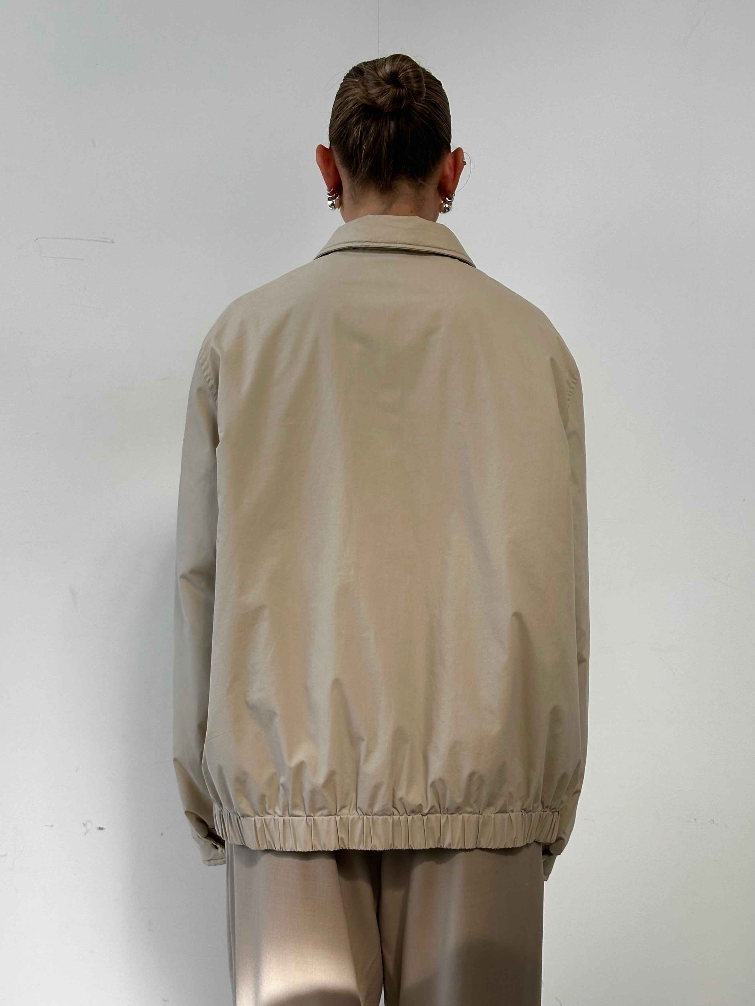 Yves Saint Laurent Pour Homme logo padded bomber jacket in XL, black with front zipper and quilted design.