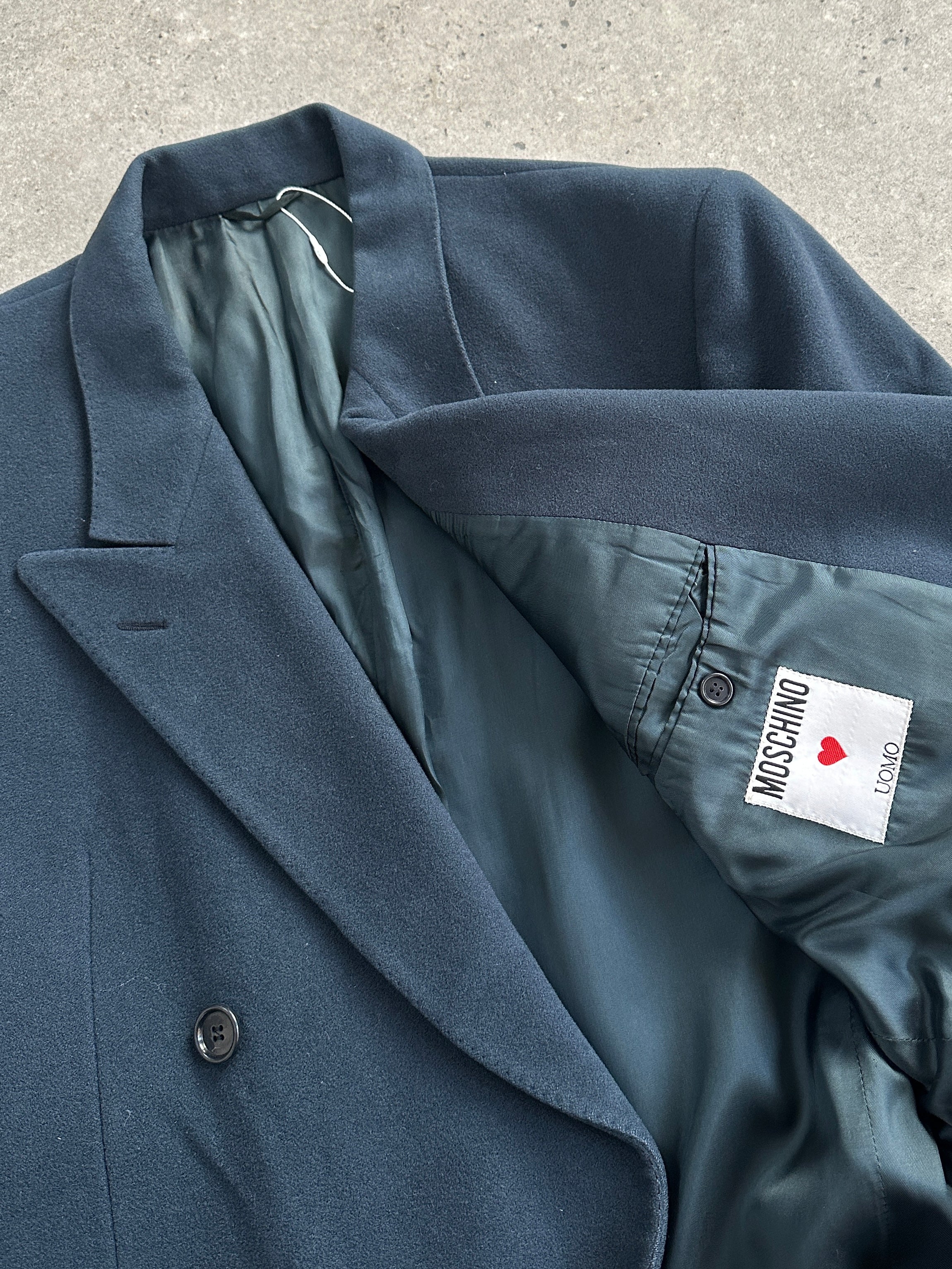 Moschino 1990s pure wool double-breasted coat in XL/XXL, stylish vintage coat with classic design and bold details.